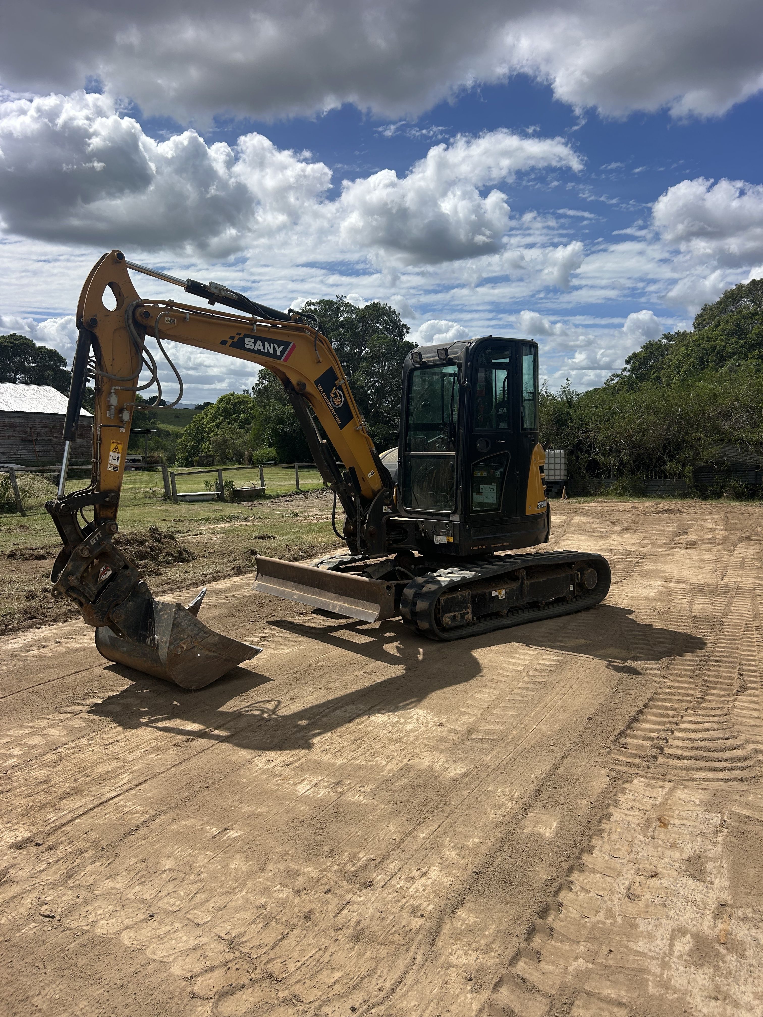 SANY SY50U excavator on a civil construction site