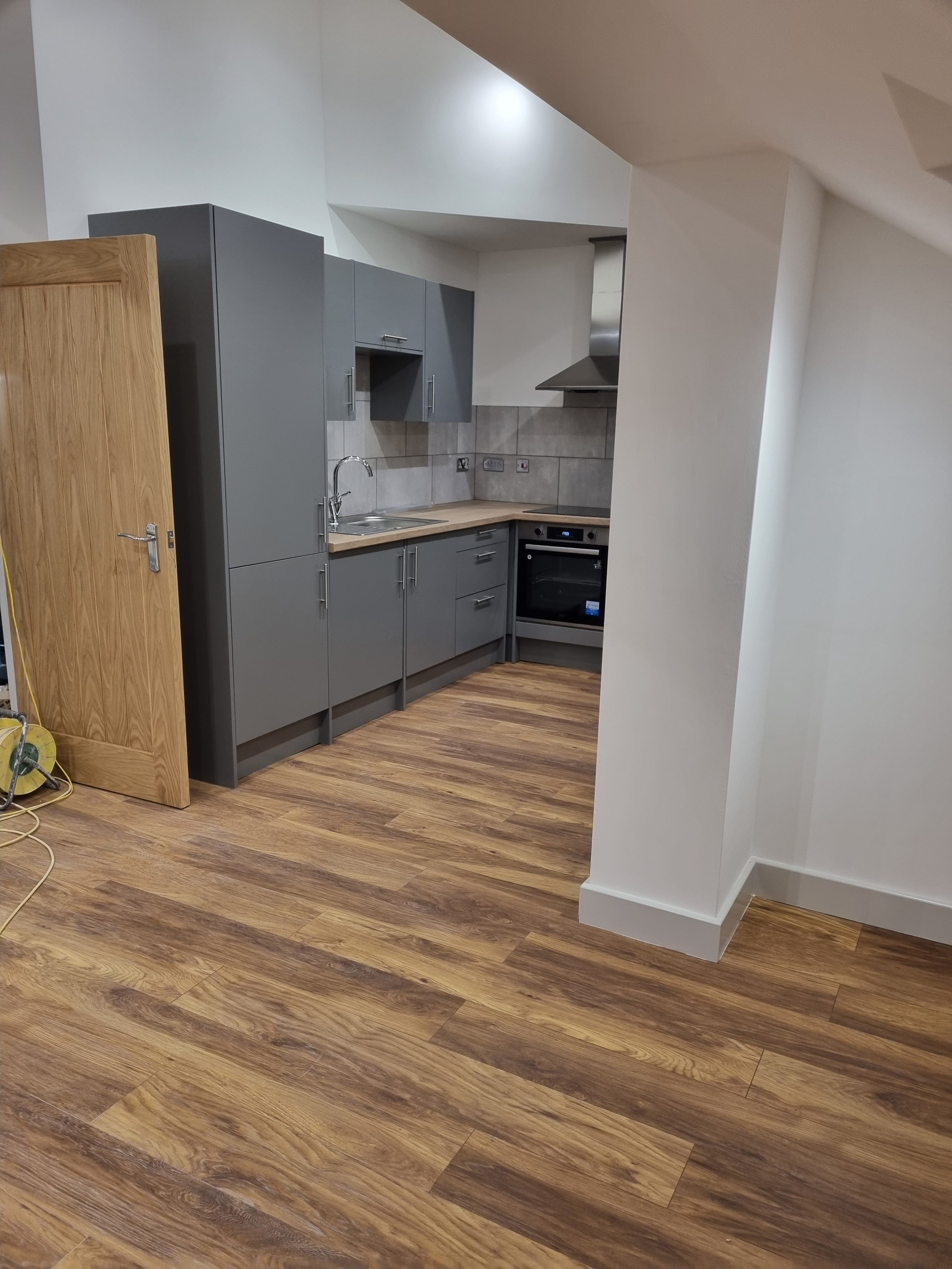 Kitchen with beautiful laminate wood flooring