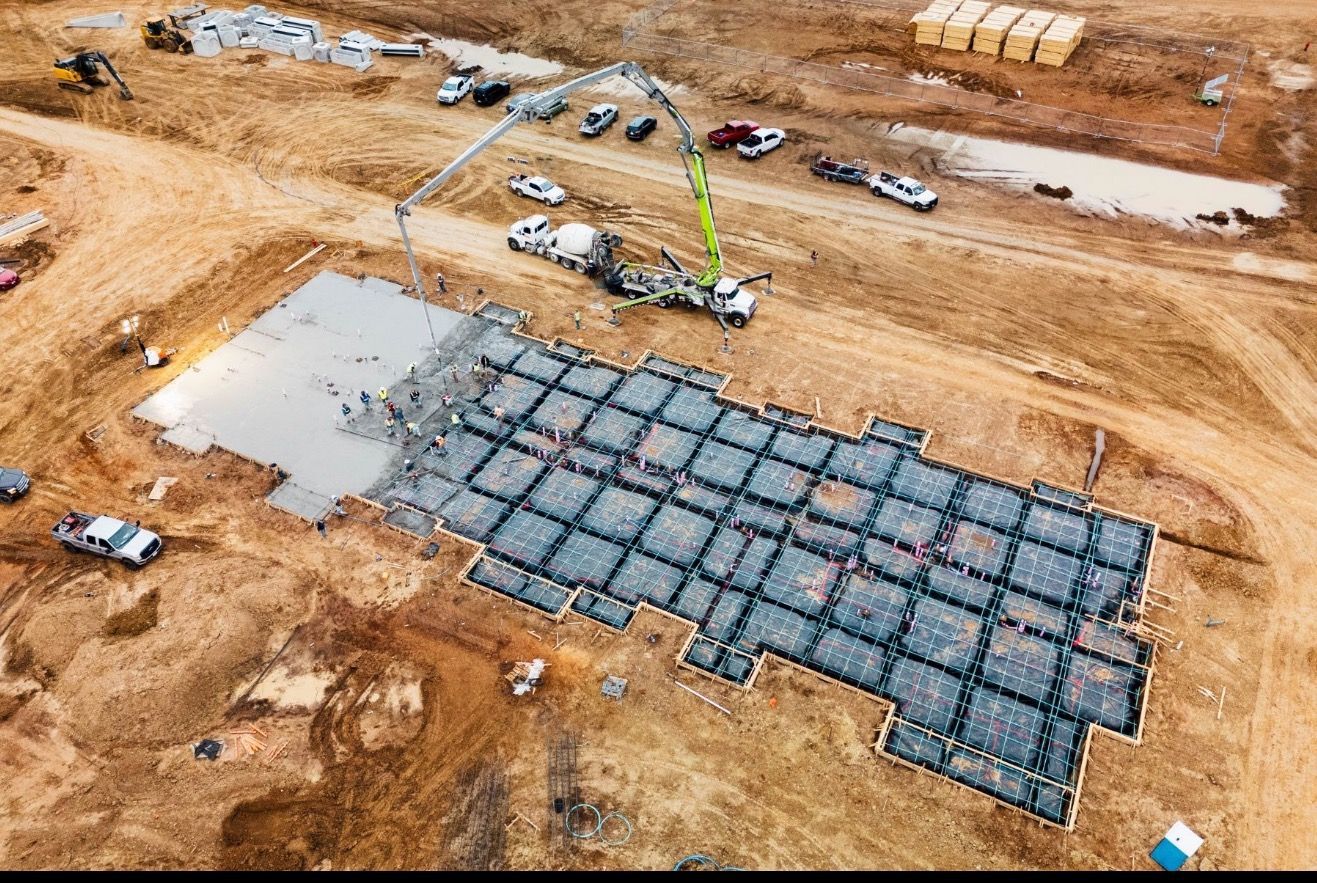 85,000 square foot commercial concrete parking lot pour in Rockwall TX by Onyx & Iron Construction