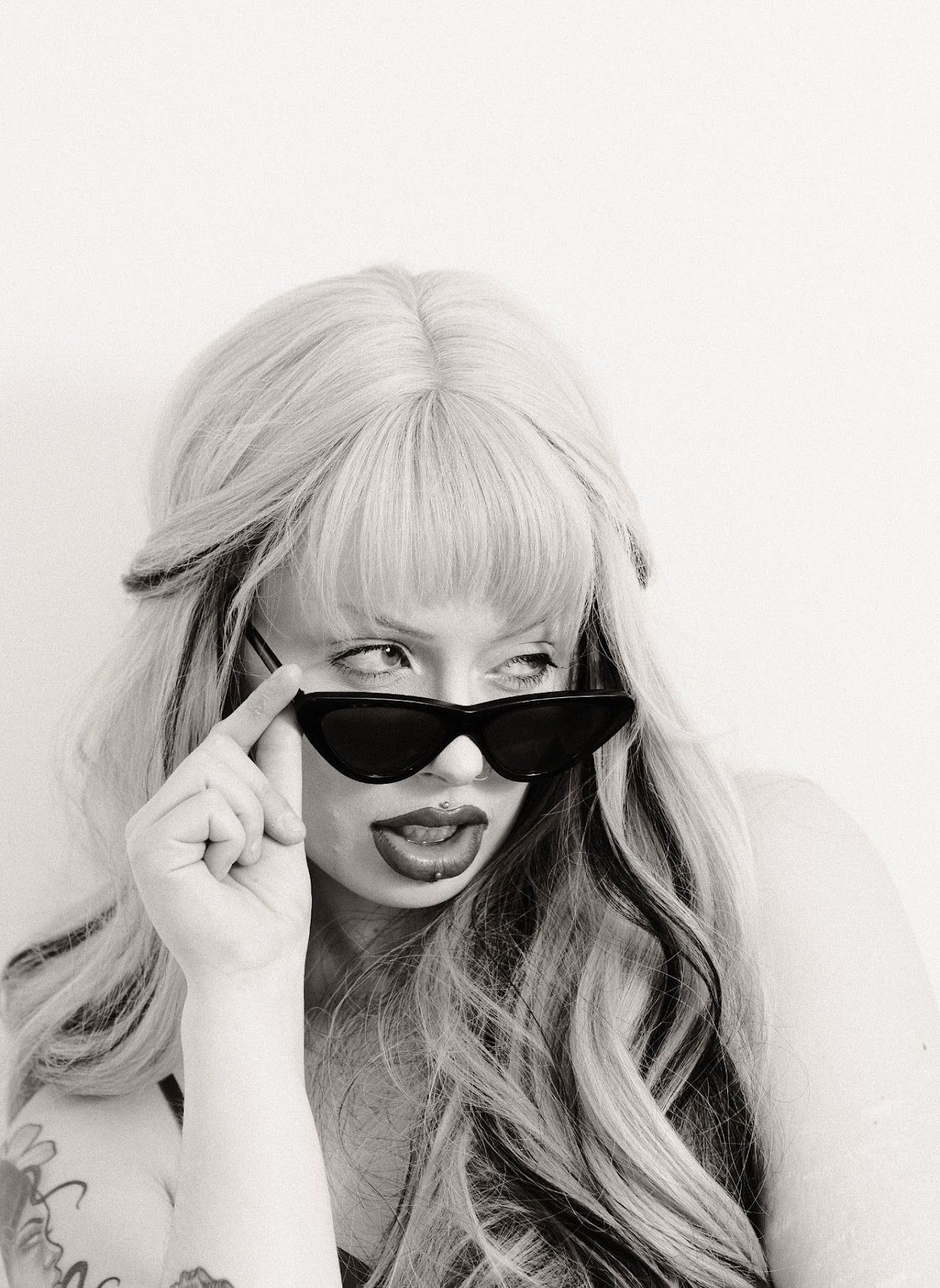 Close-up portrait with cat-eye sunglasses