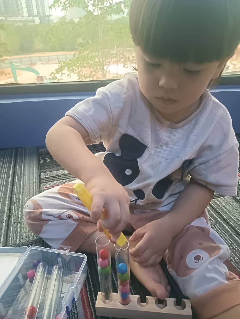 Tweezers and test tubes sorting activity