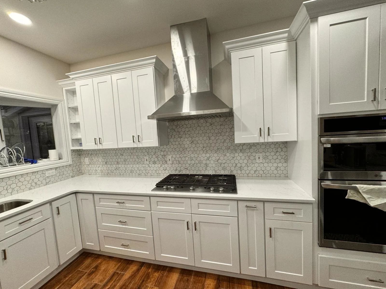 Kitchen with hexagonal tile backsplash