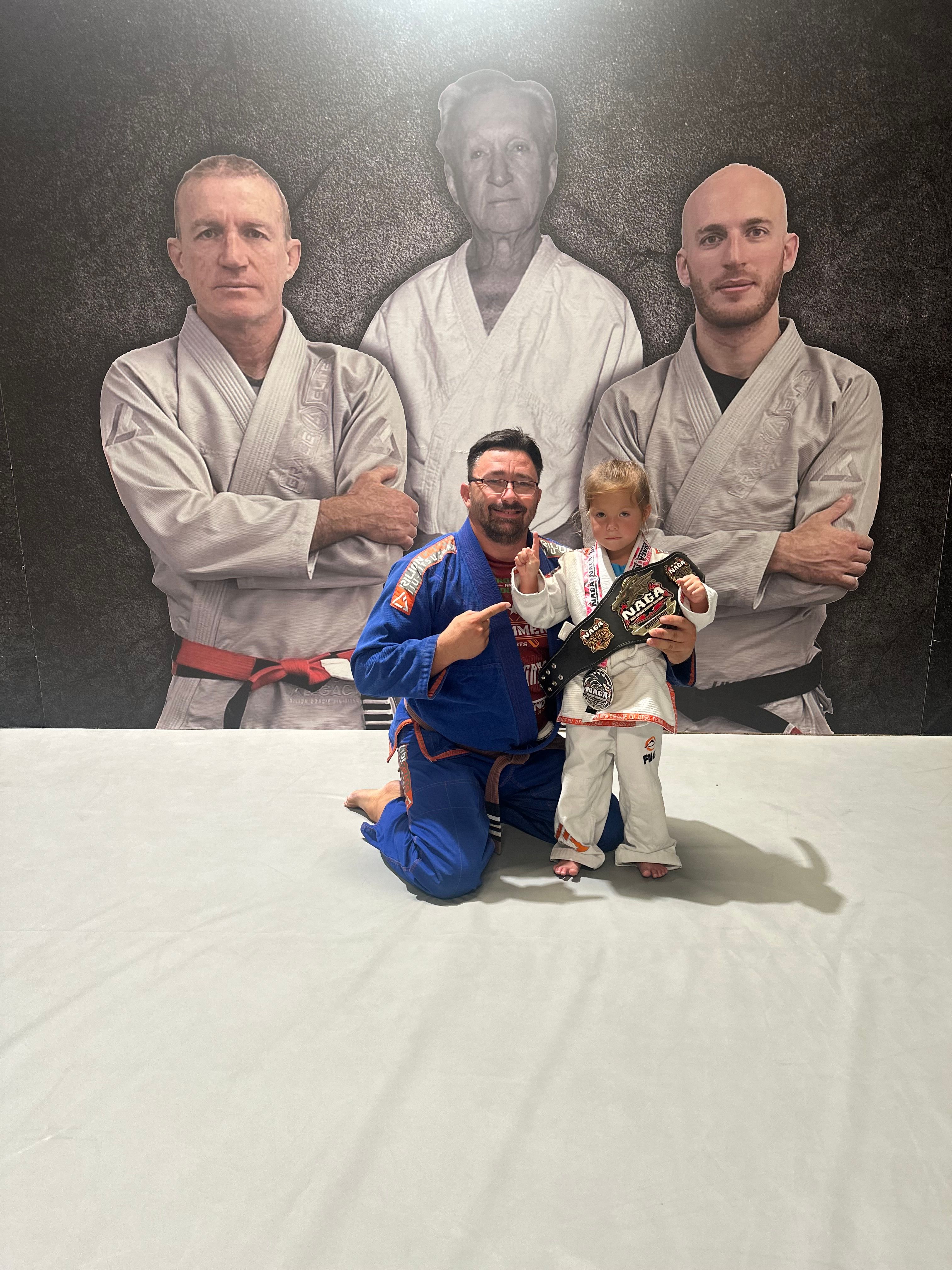 Young student Isabella winning her first tournament