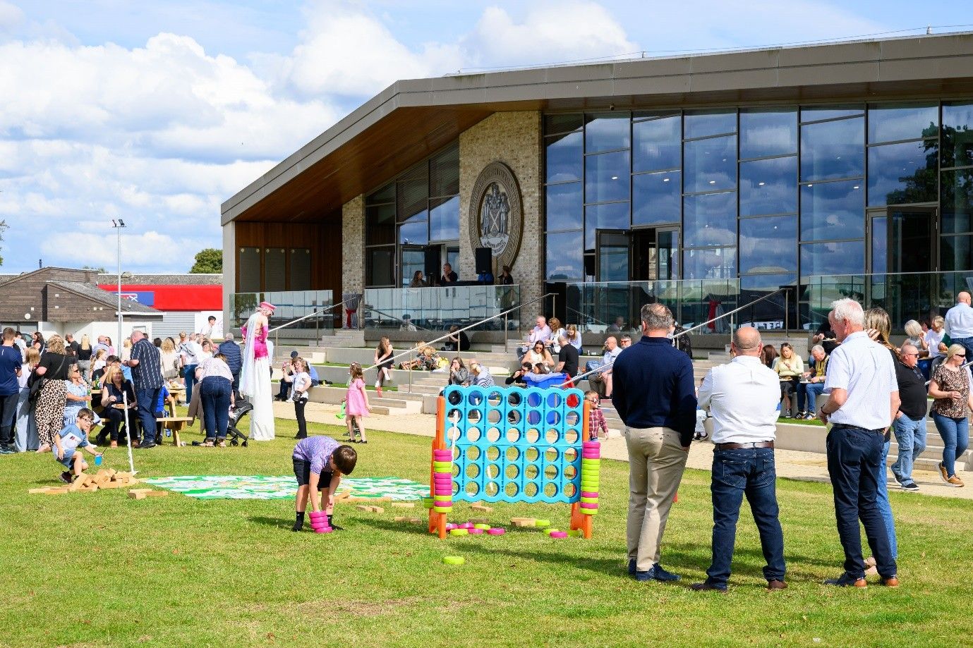 Large corporate family fun day with giant Connect Four and outdoor activities organised by Event Collection
