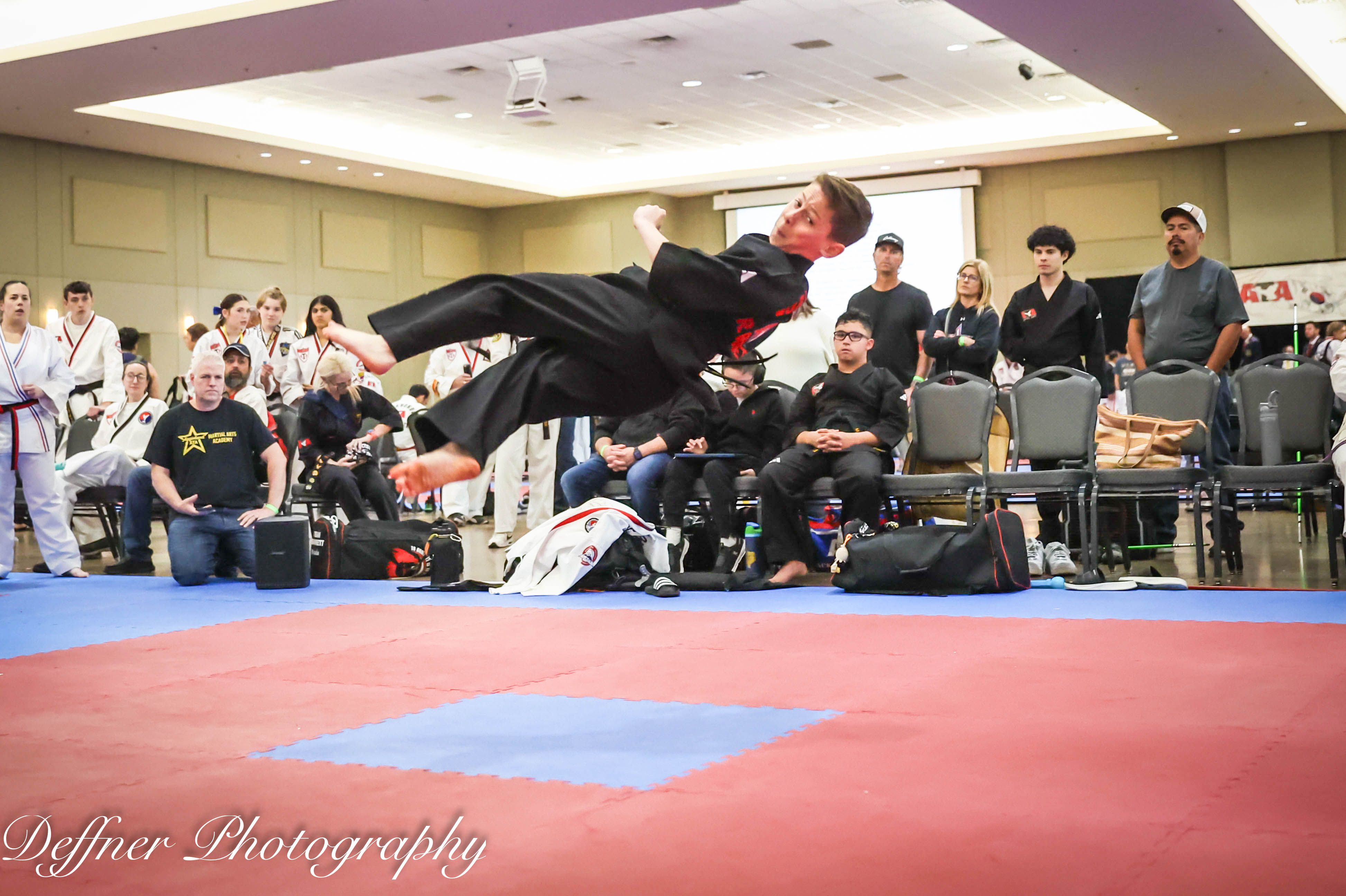 Flying kick at tournament