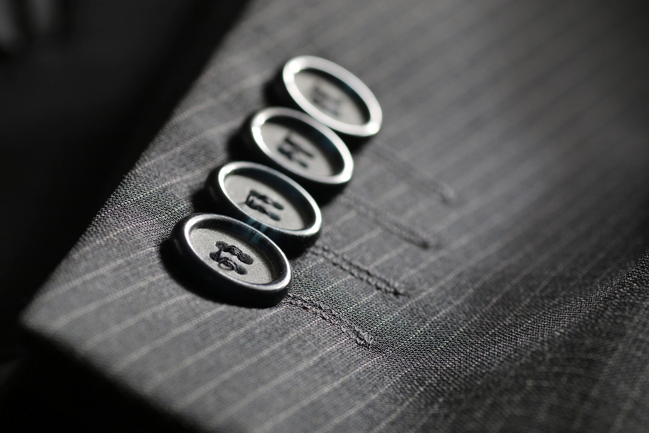 Bespoke suit cuff detail — fine tailoring by BLU Fine Menswear Houston