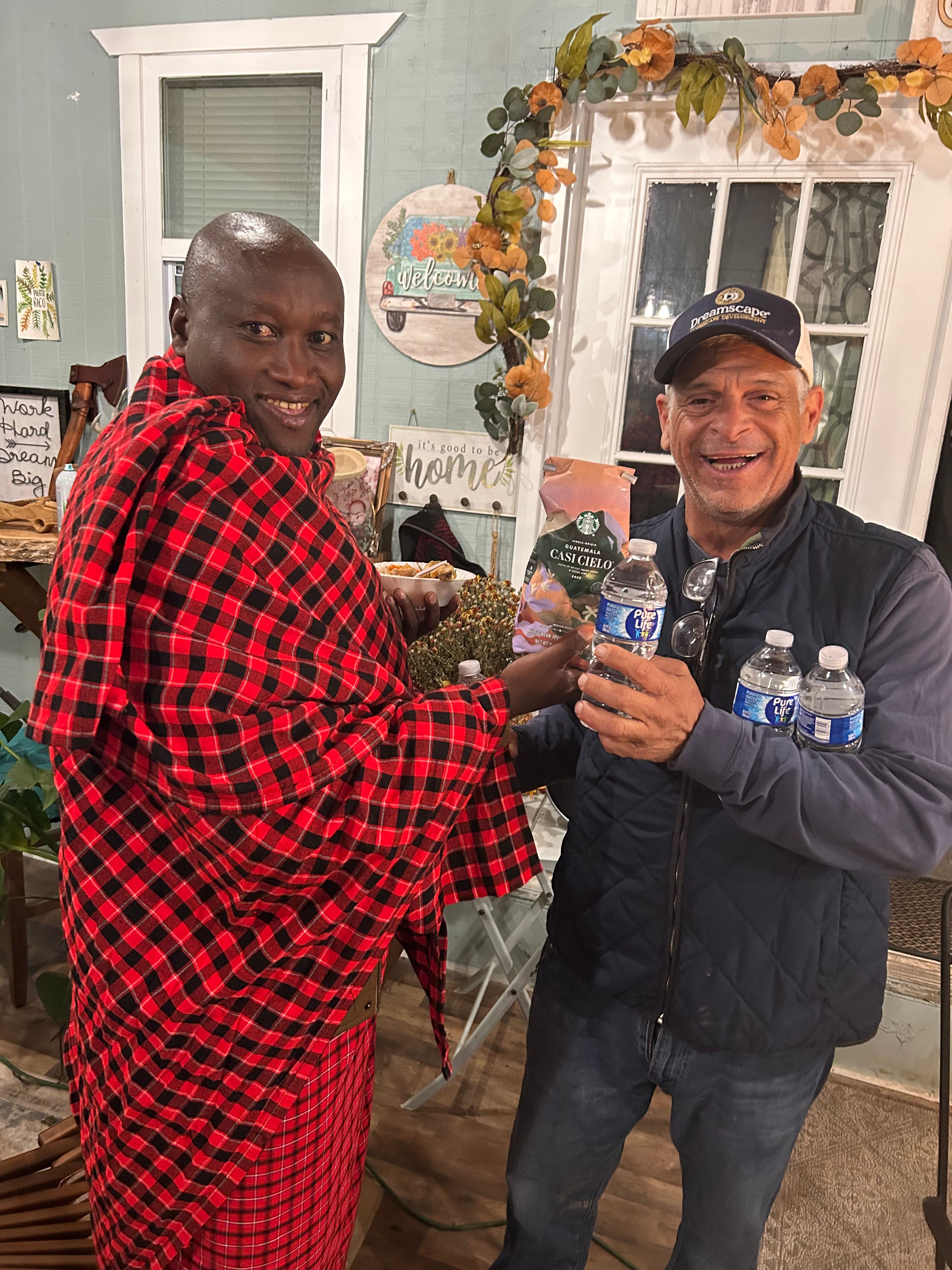 Hector with community member