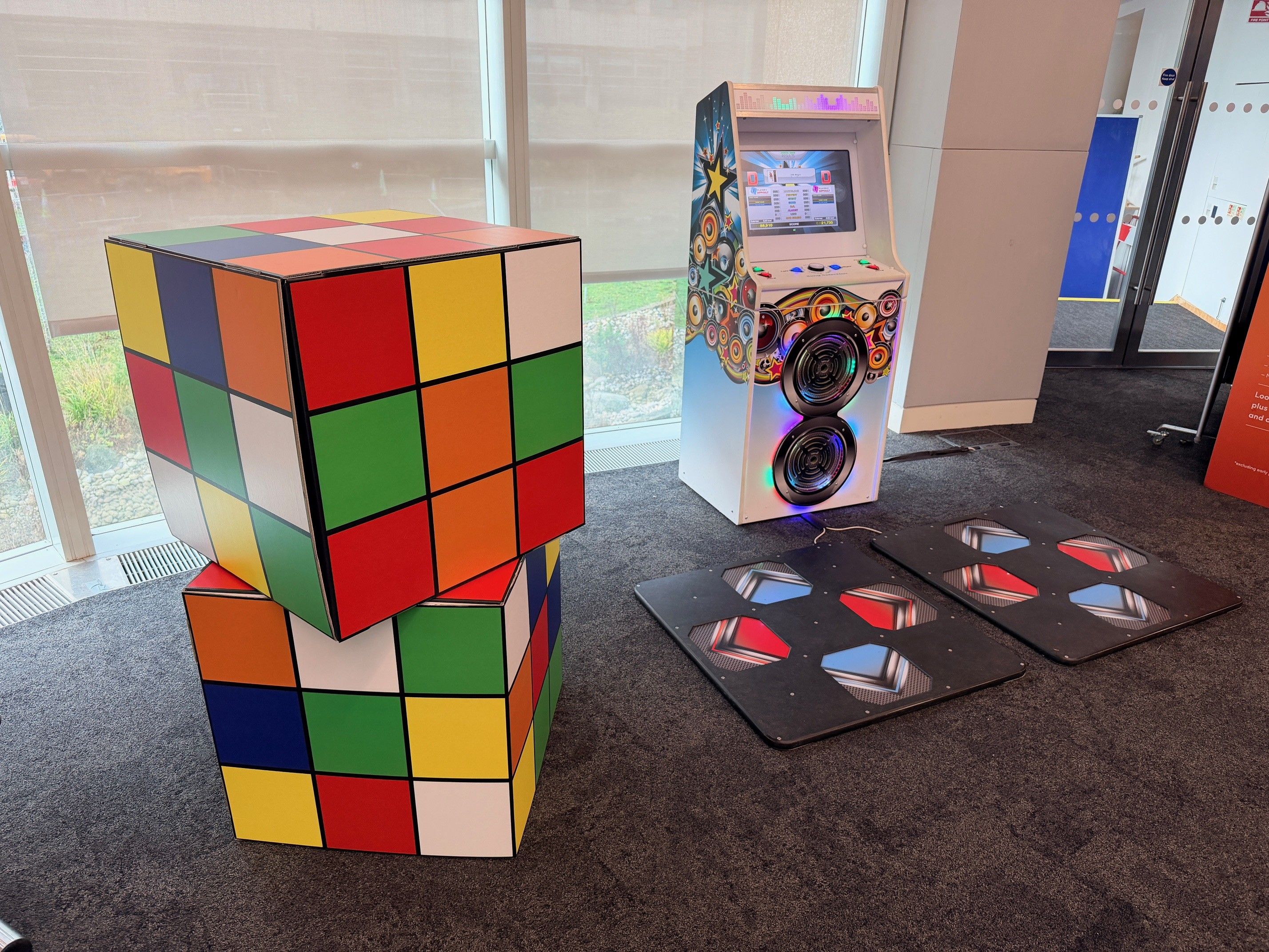 Seamless office event setup with team activities including arcade games and interactive challenges organised by Event Collection