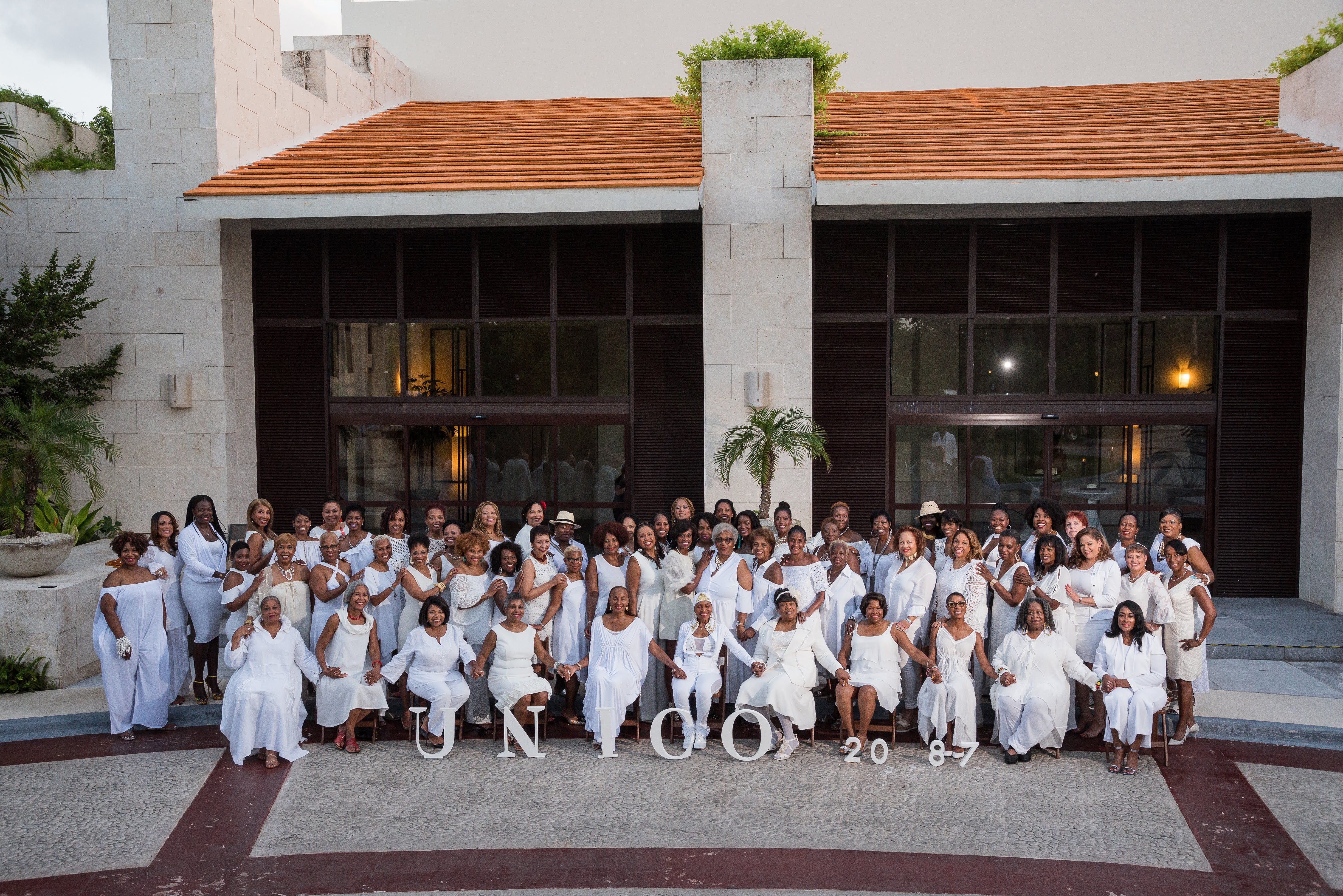 I Am That Woman Movement 5th Annual Retreat - women dressed in white on steps in St. Thomas, USVI