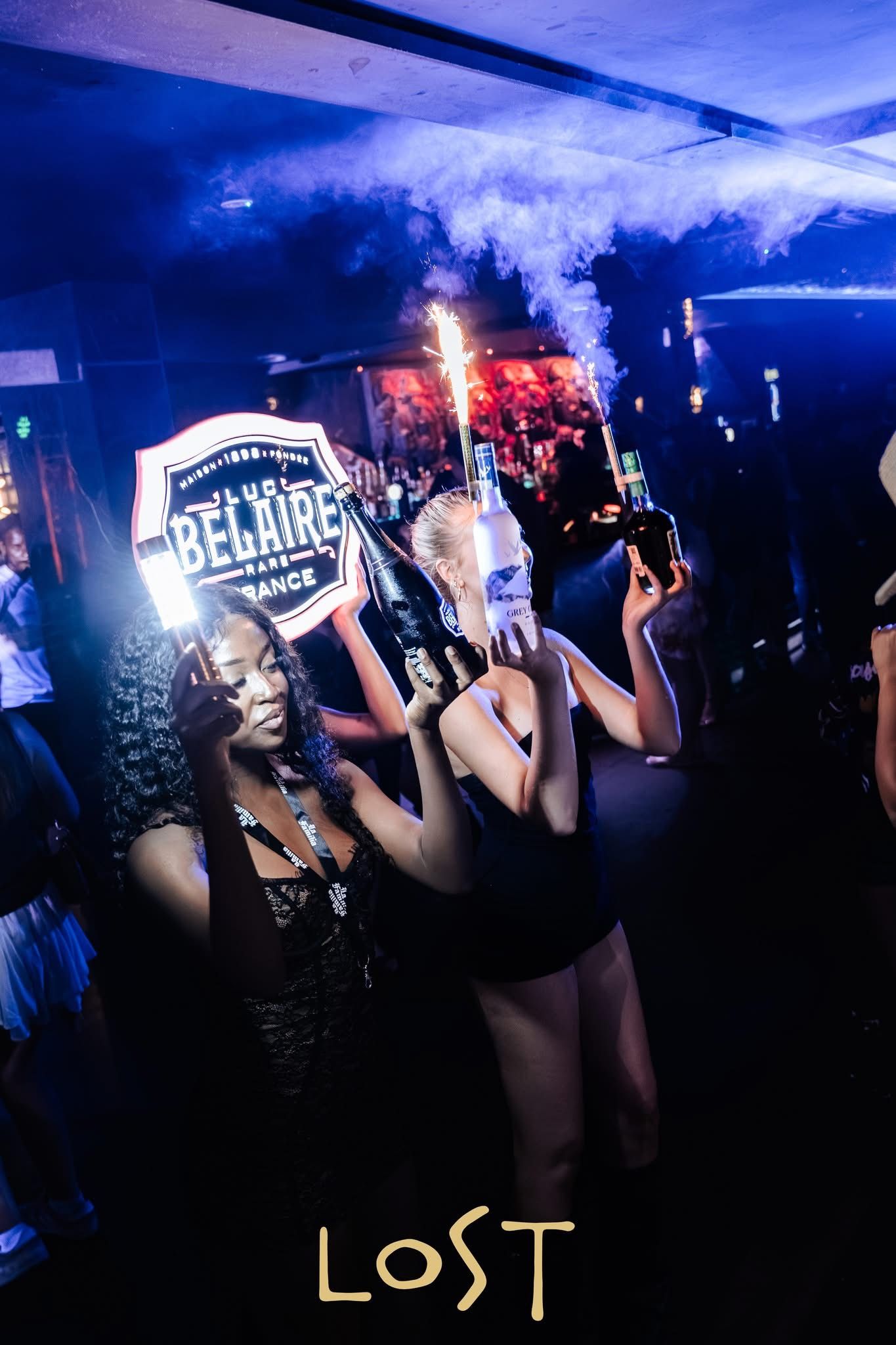 Celebration with sparklers and Belaire