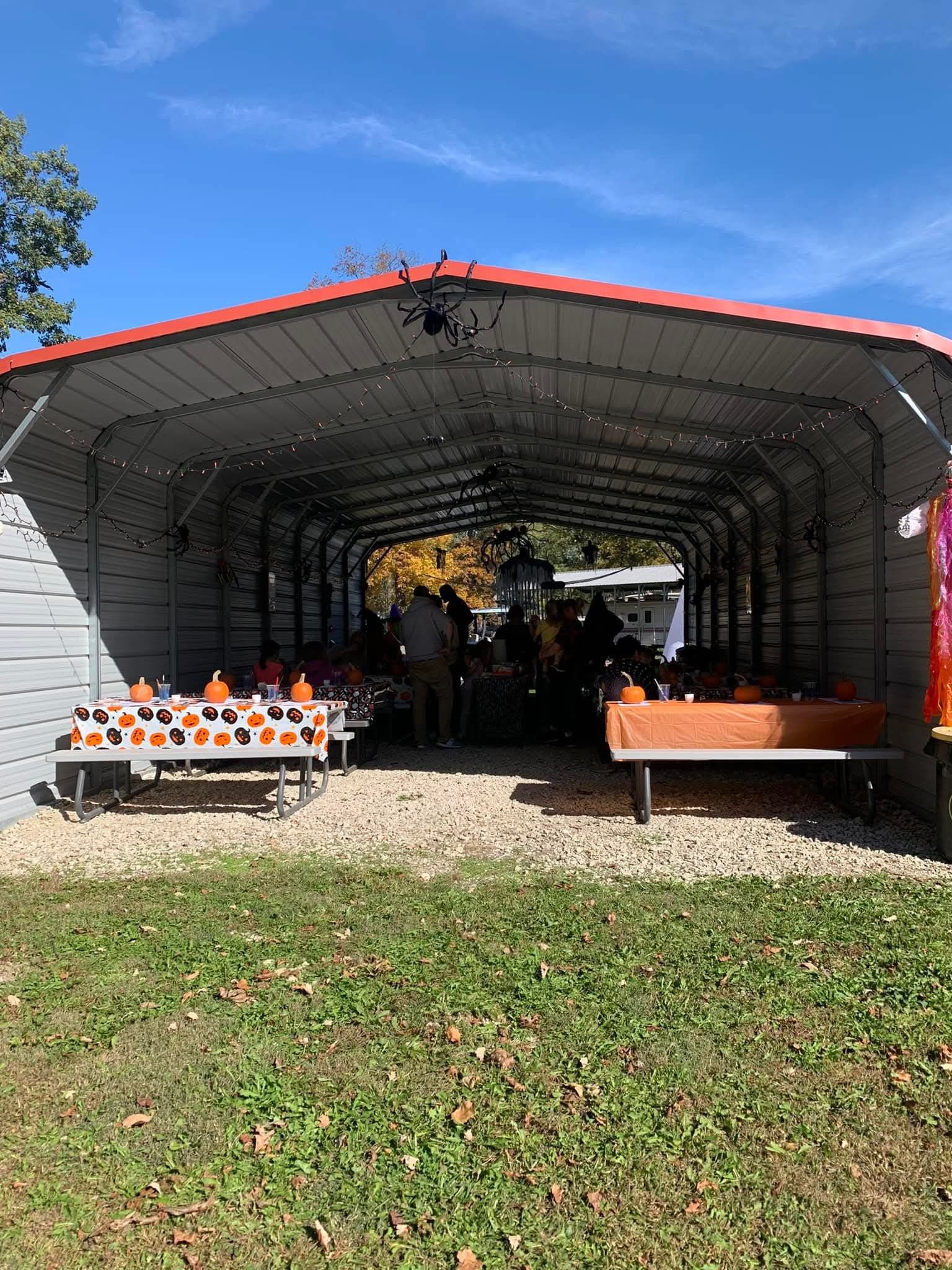 Halloween celebration with spider decorations at Welcome Woods campground pavilion