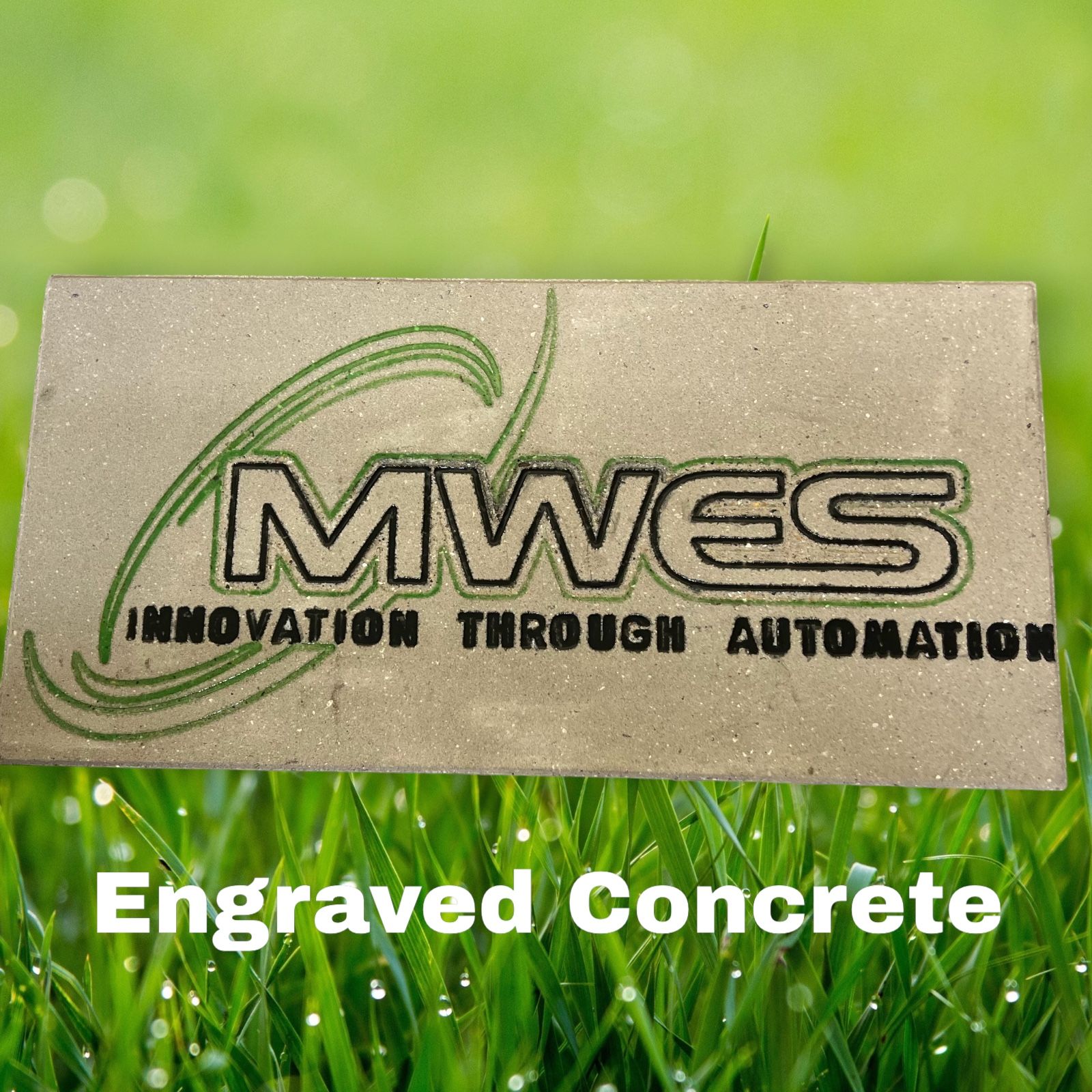 MWES Innovation Through Automation logo engraved in concrete