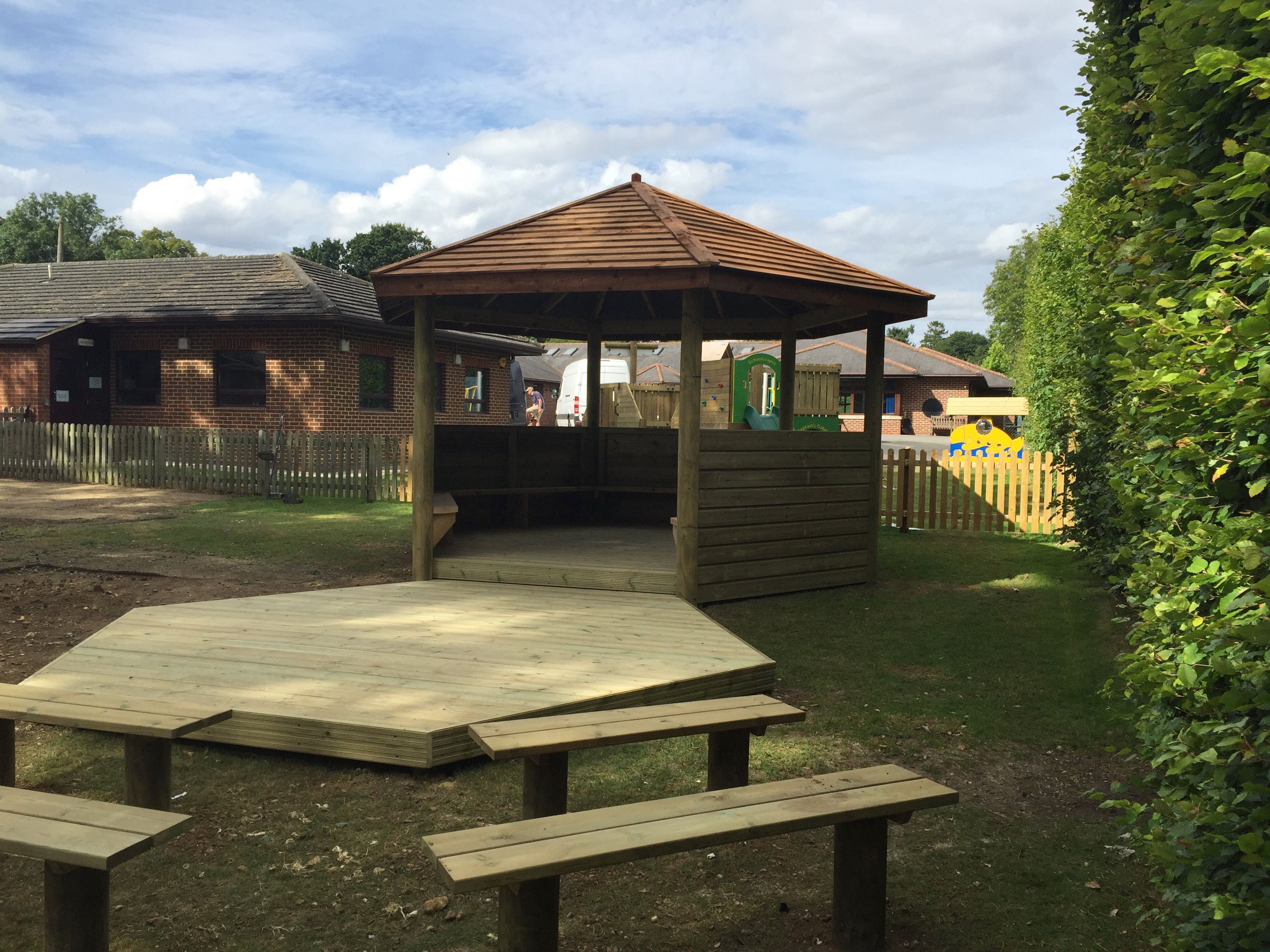 Hexagonal timber gazebo installed in a school playground