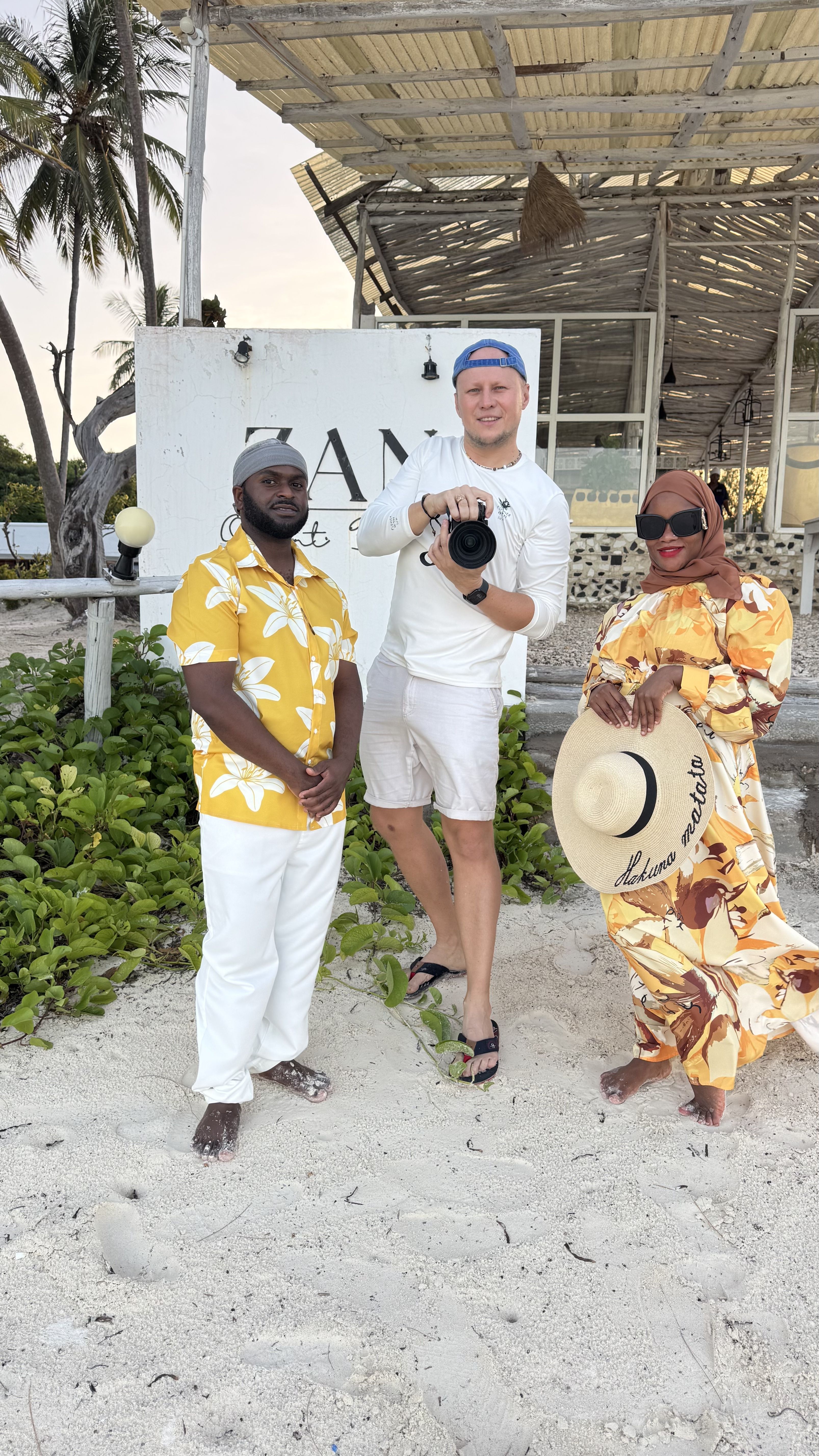 Damian with happy clients after photoshoot session in Zanzibar