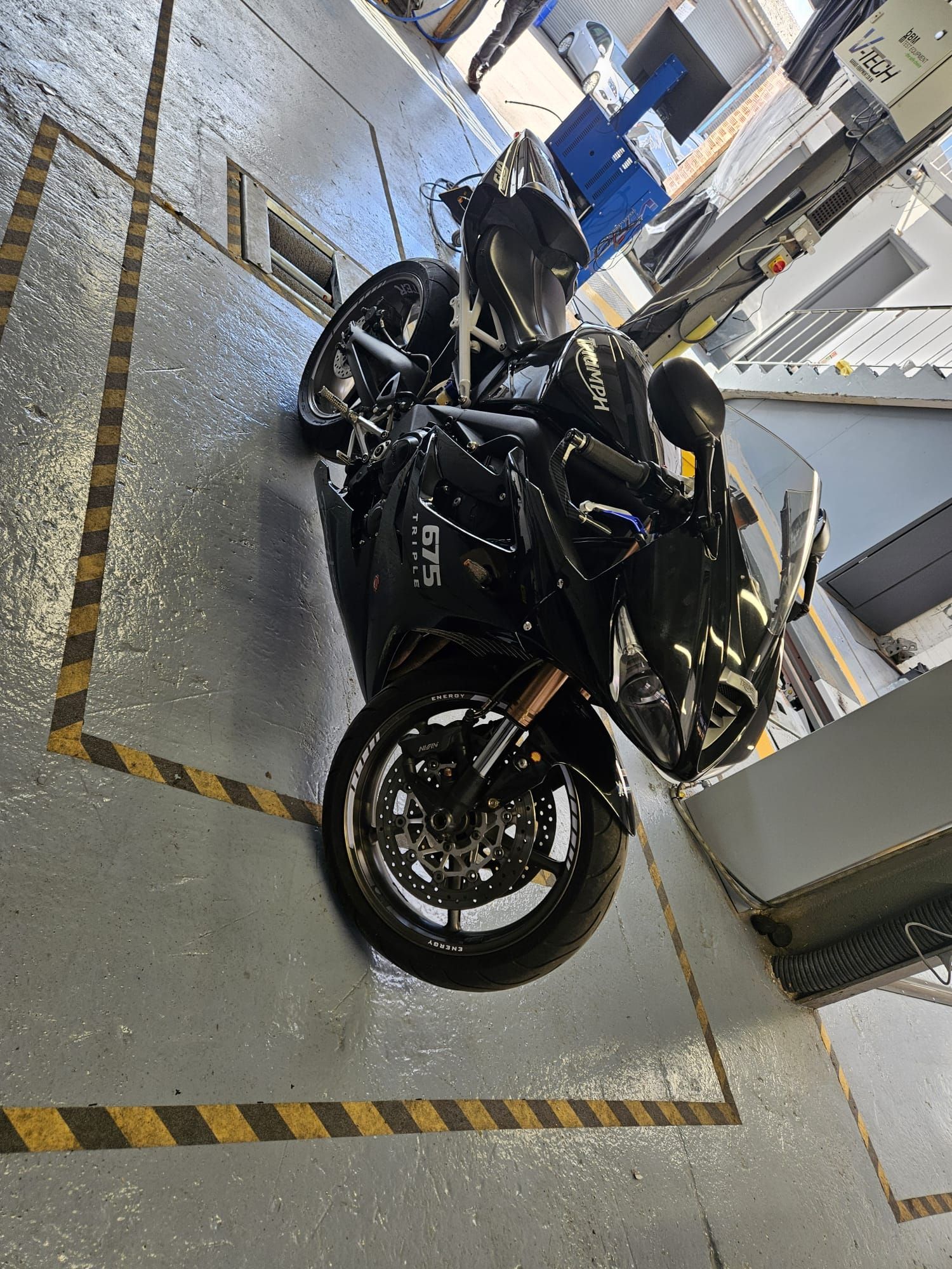 Triumph motorcycle in workshop