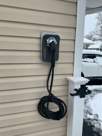 EV charger mounted on house siding