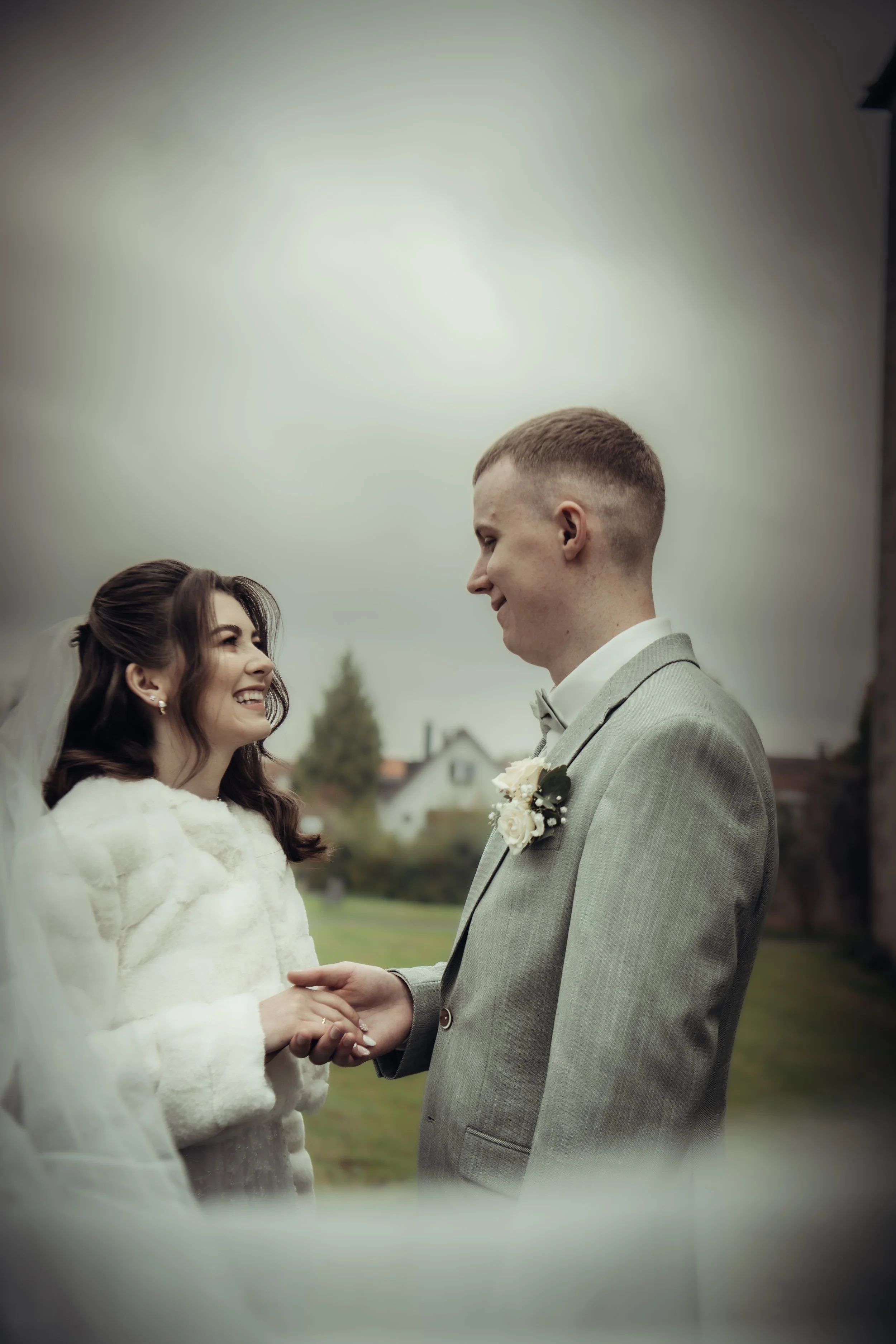Family celebration and laughter during reception, candid wedding moment