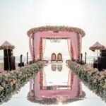Mandap setup with floral aisle