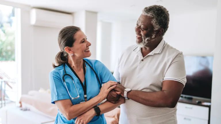 True Bloom caregiver with resident