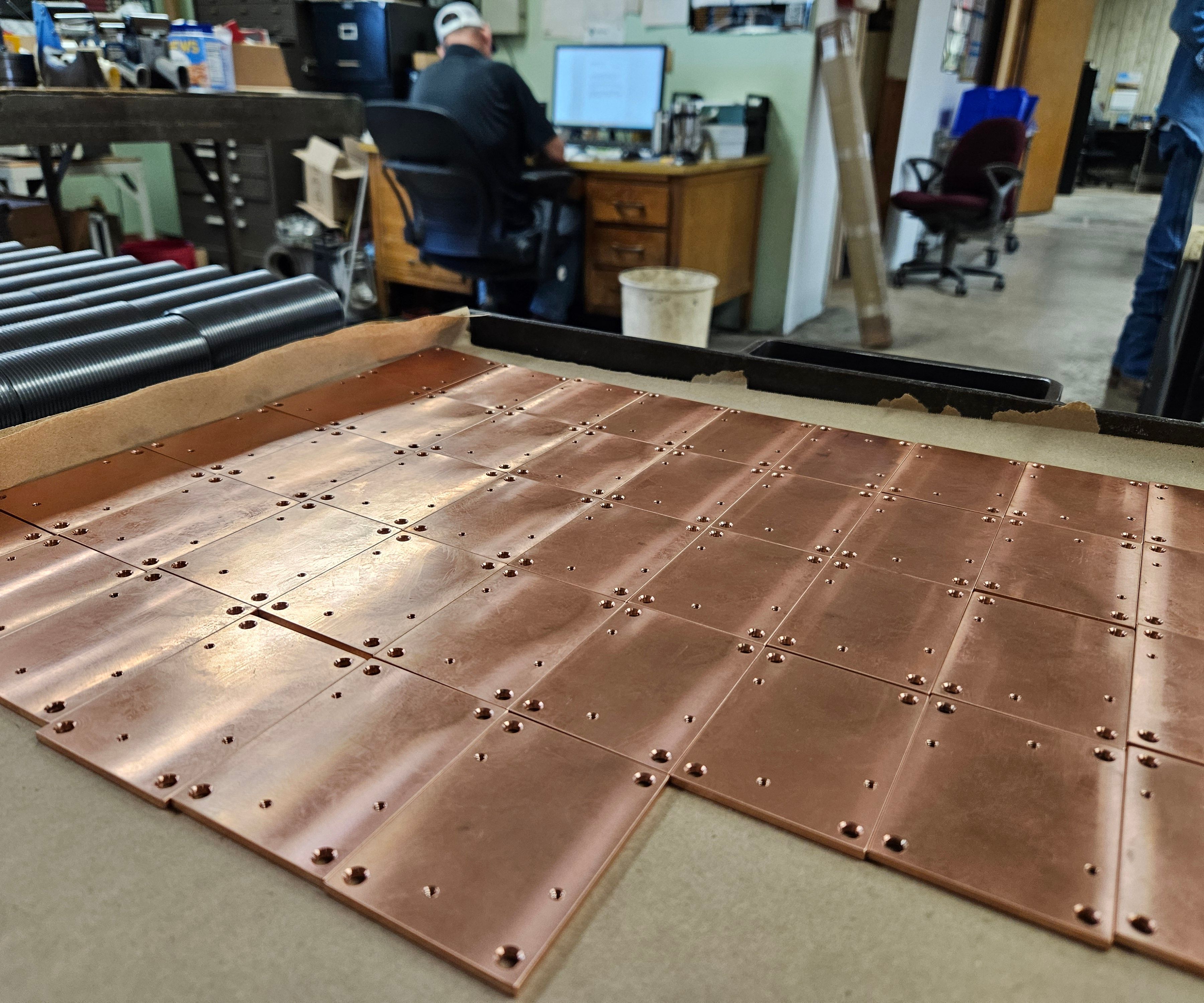 Production floor with copper plates