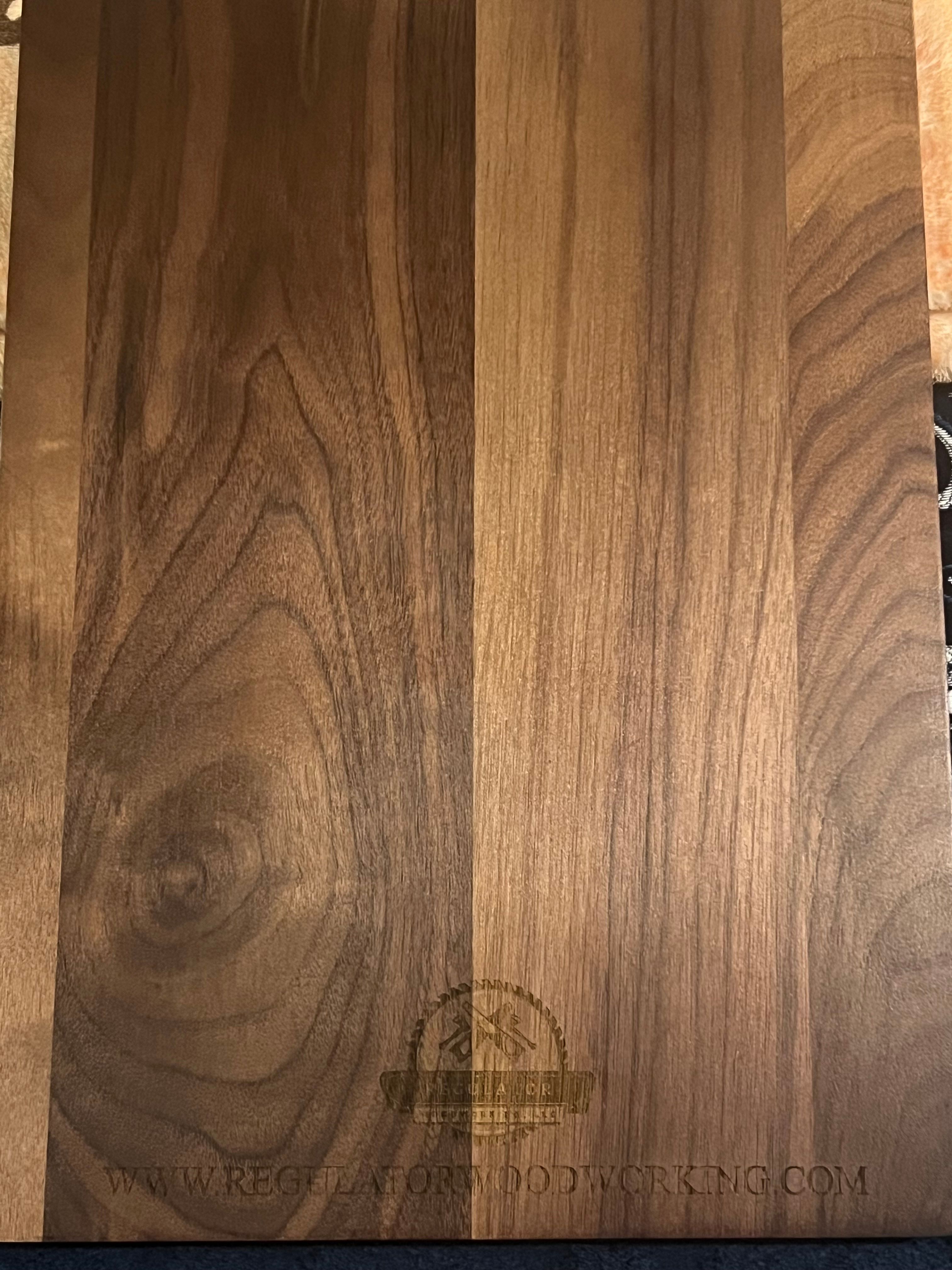 Laser engraved logo on natural wood surface