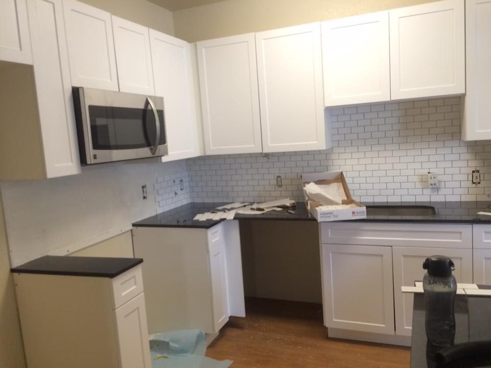 Kitchen backsplash installation in progress