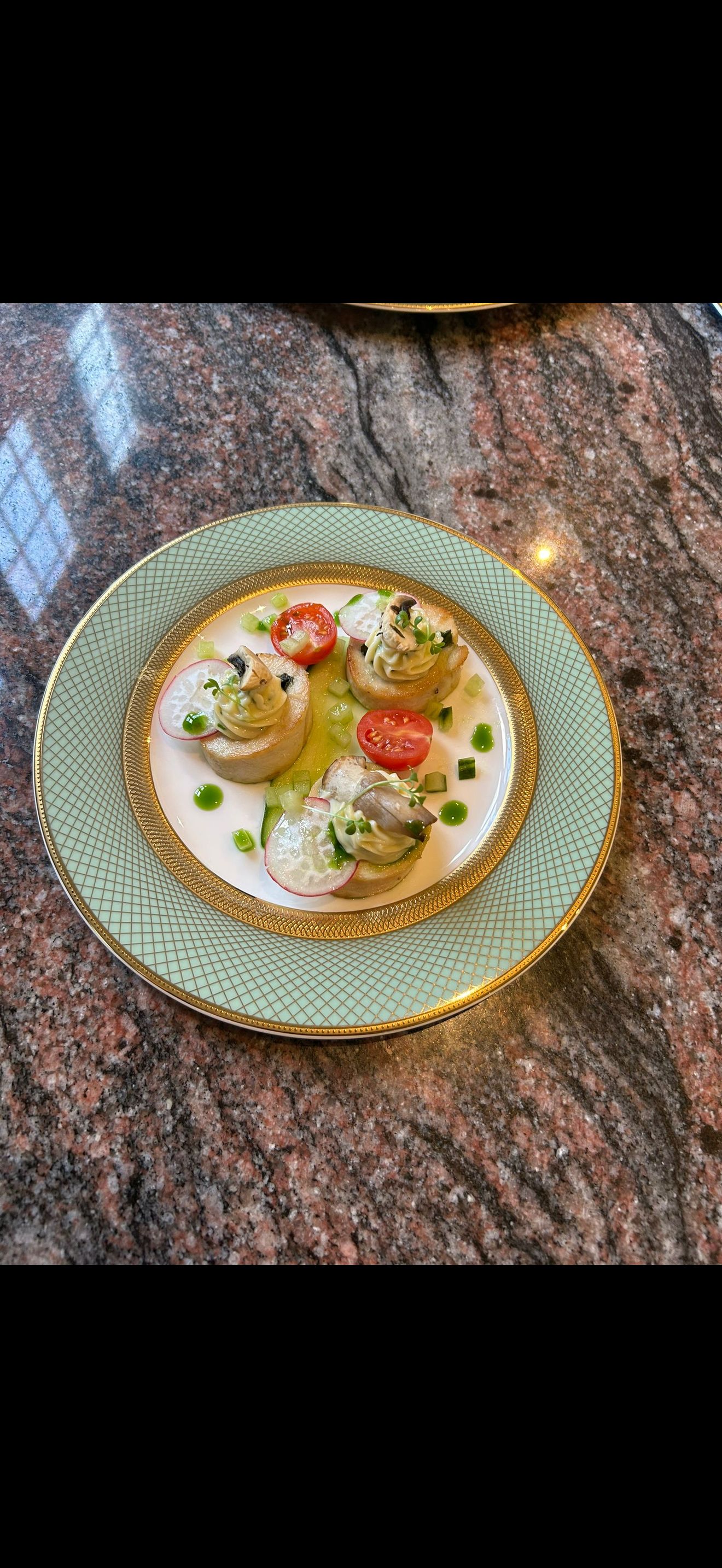 Gourmet canapés with cream, mushroom and microgreens on decorative plate