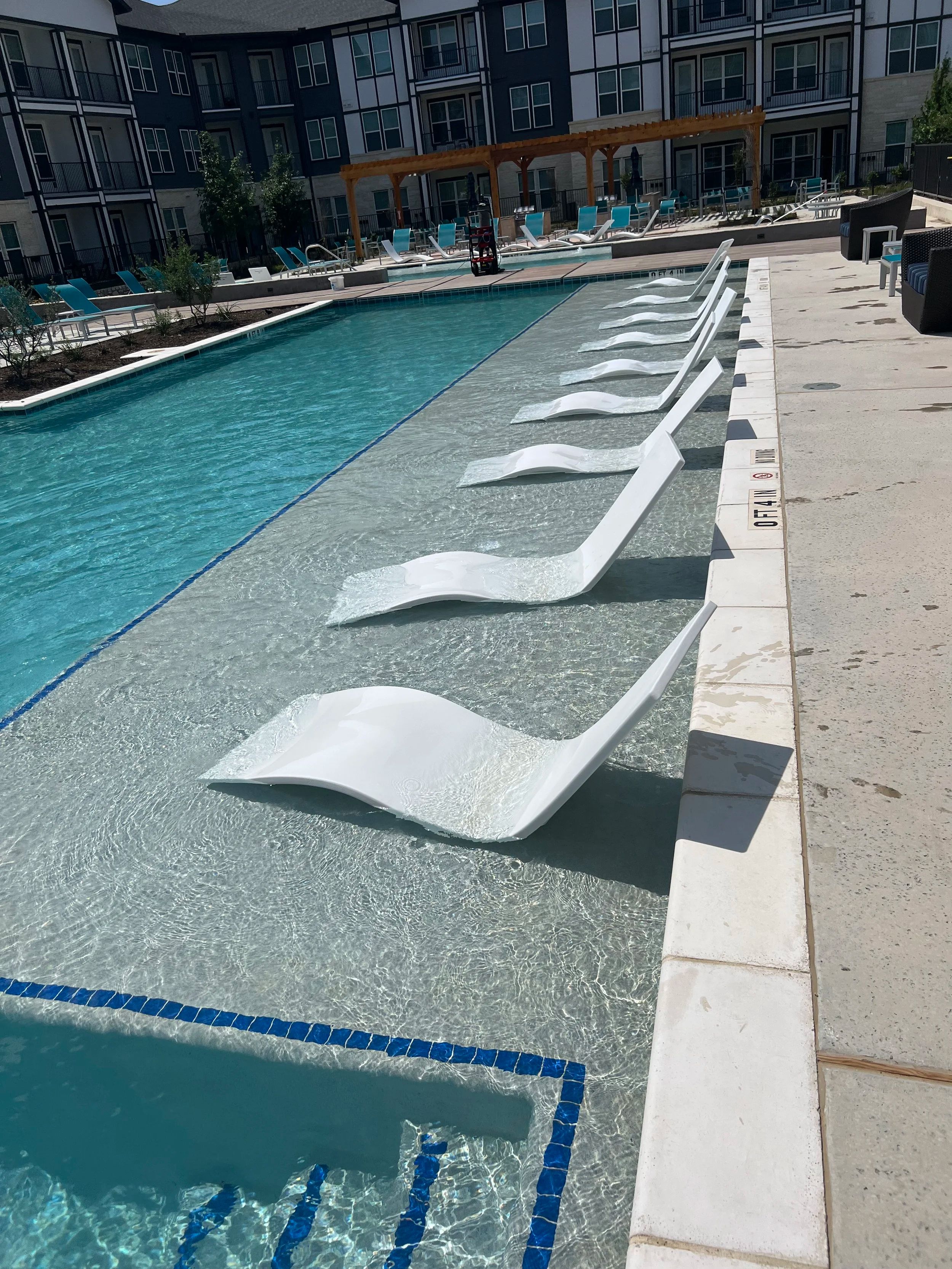 Commercial pool with lounge chairs