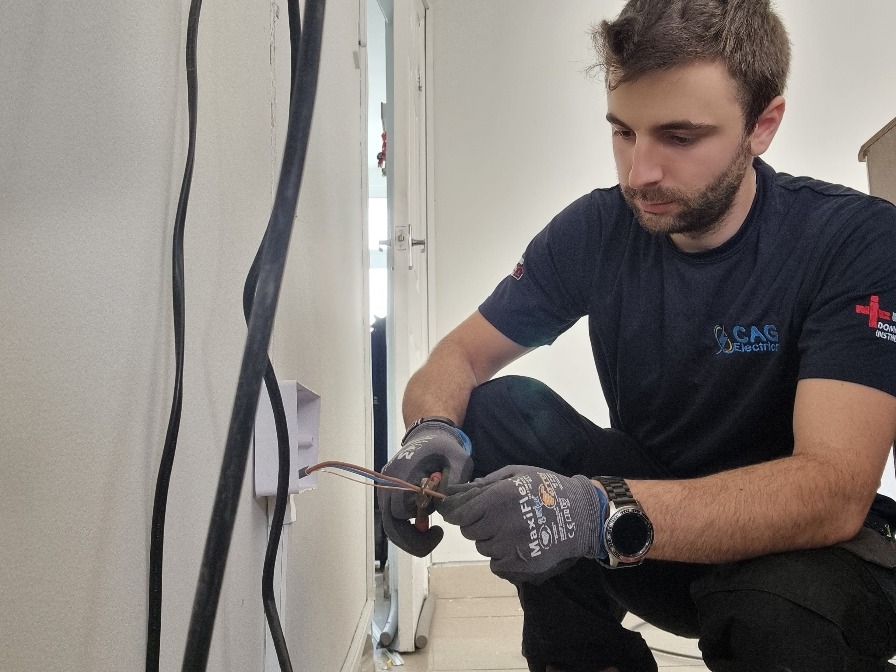 Electrician Newport working on electrical installation and rewiring