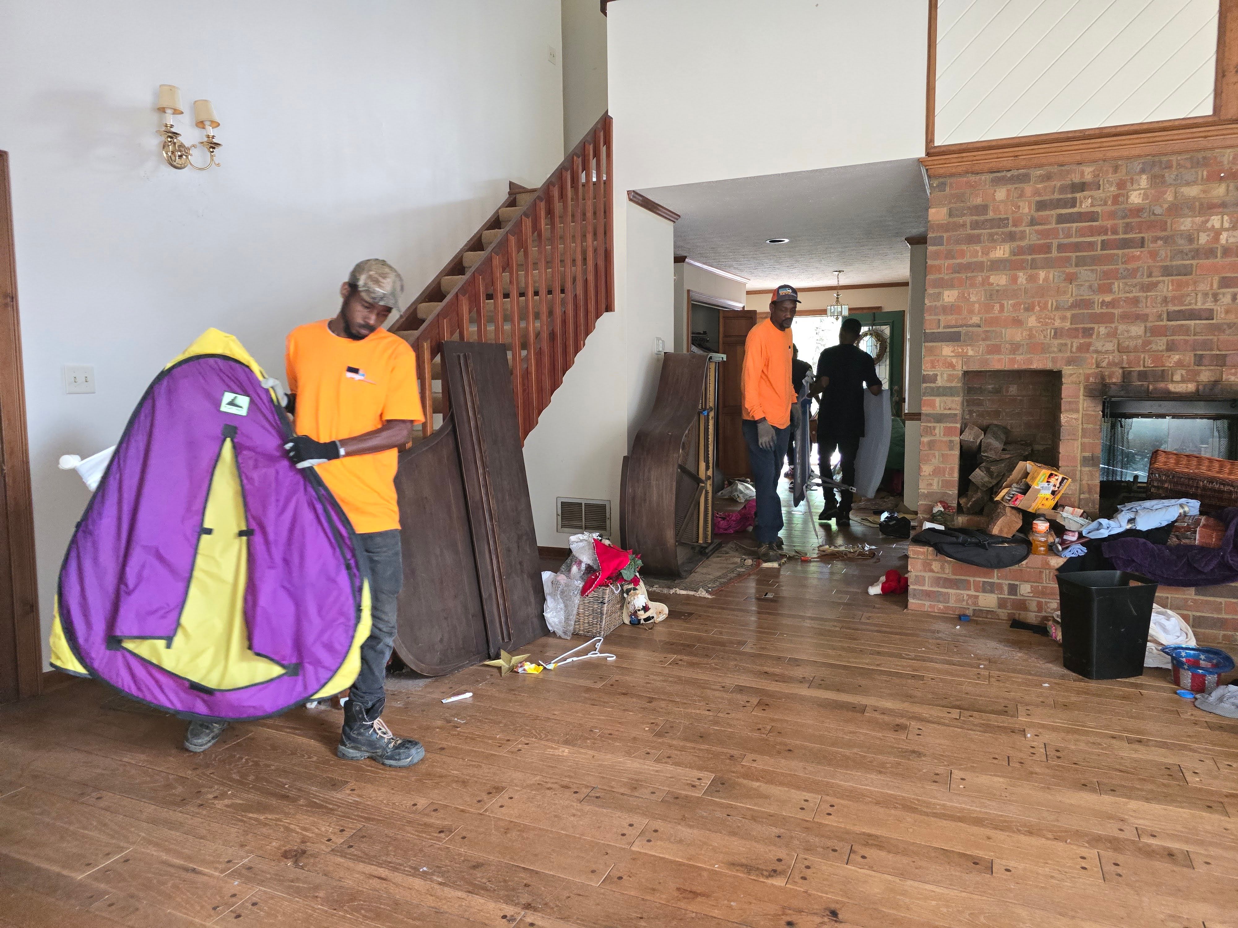 Team working inside home cleanout