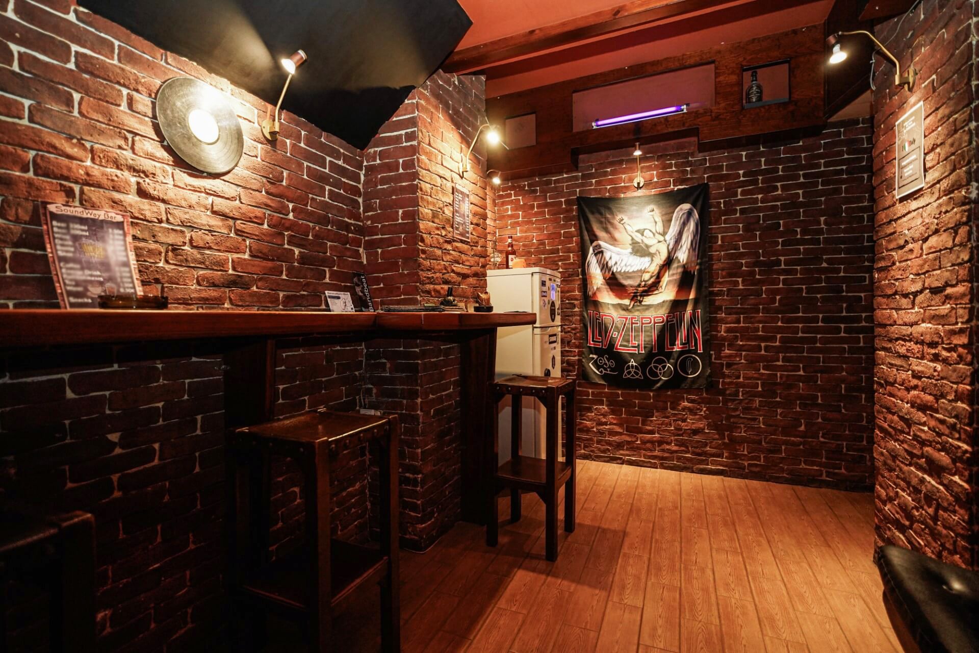 Bar with Led Zeppelin tapestry