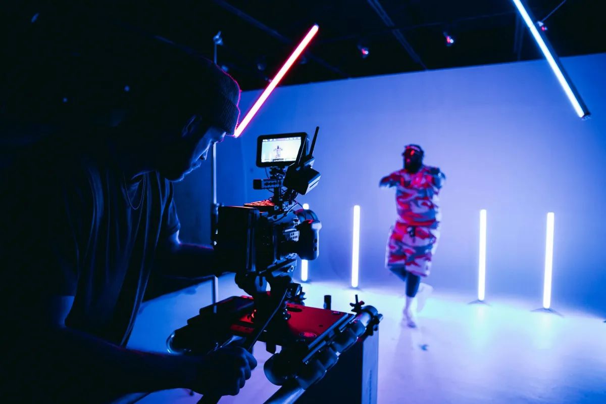 Video production at Geeks Studio - professional camera and neon lighting