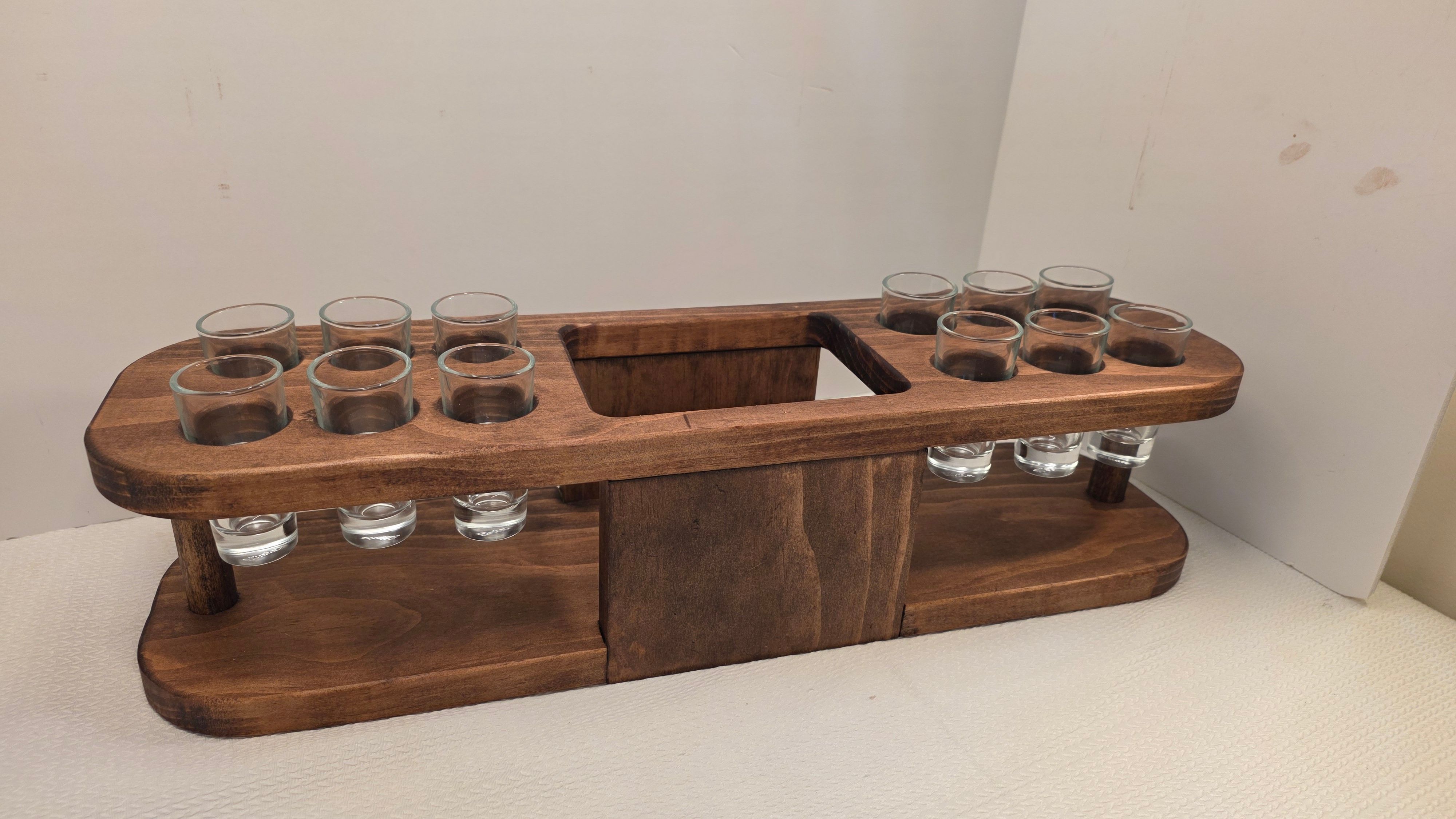 Wooden shot glass holder with twelve glasses top view