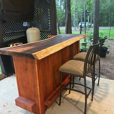 Custom outdoor live edge bar with epoxy countertop by Bark and Brushes Abita Springs Louisiana