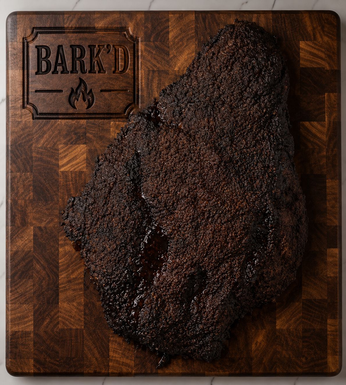 BARK'D whole brisket on cutting board