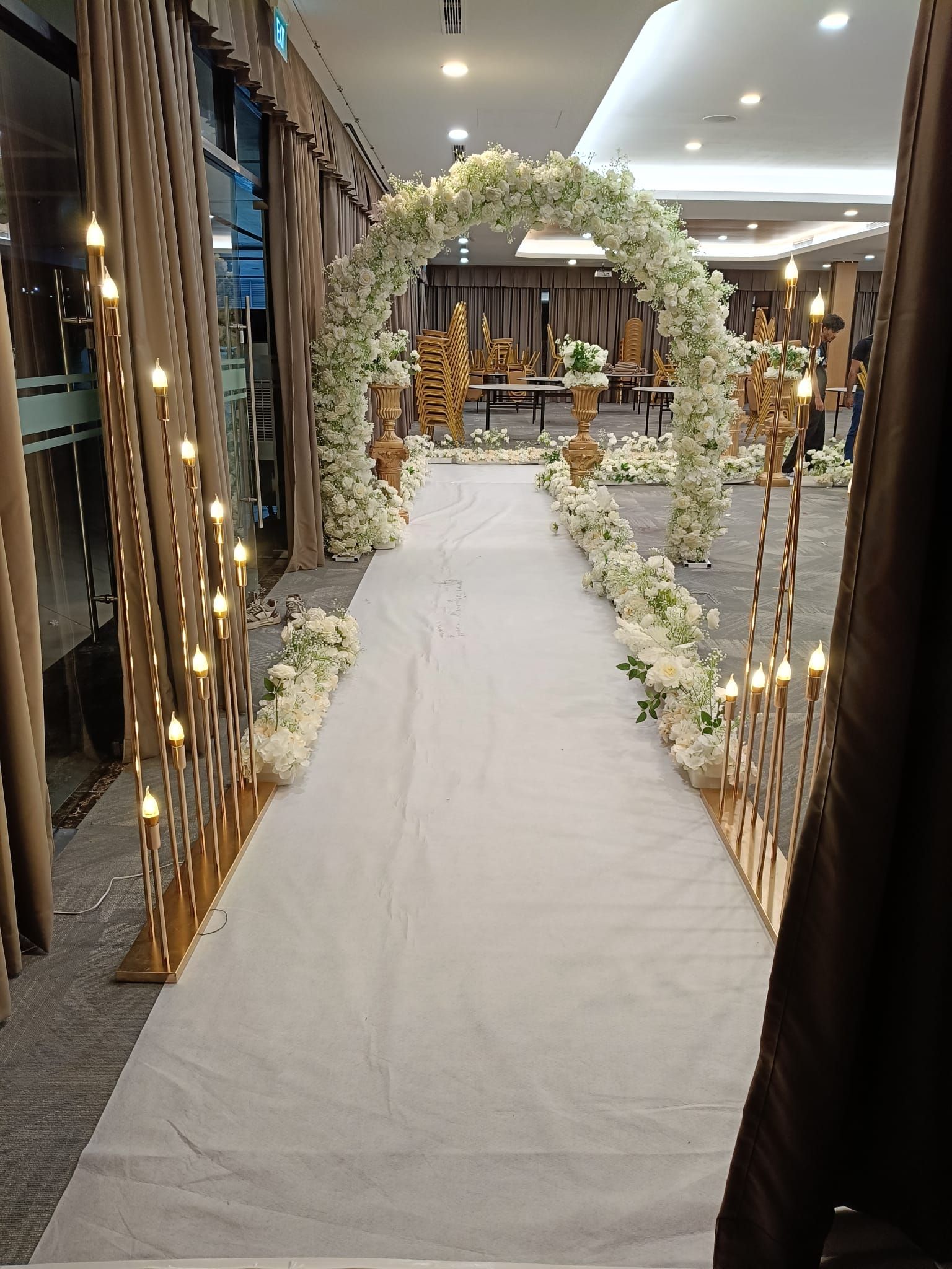 Aisle decor with floral arch