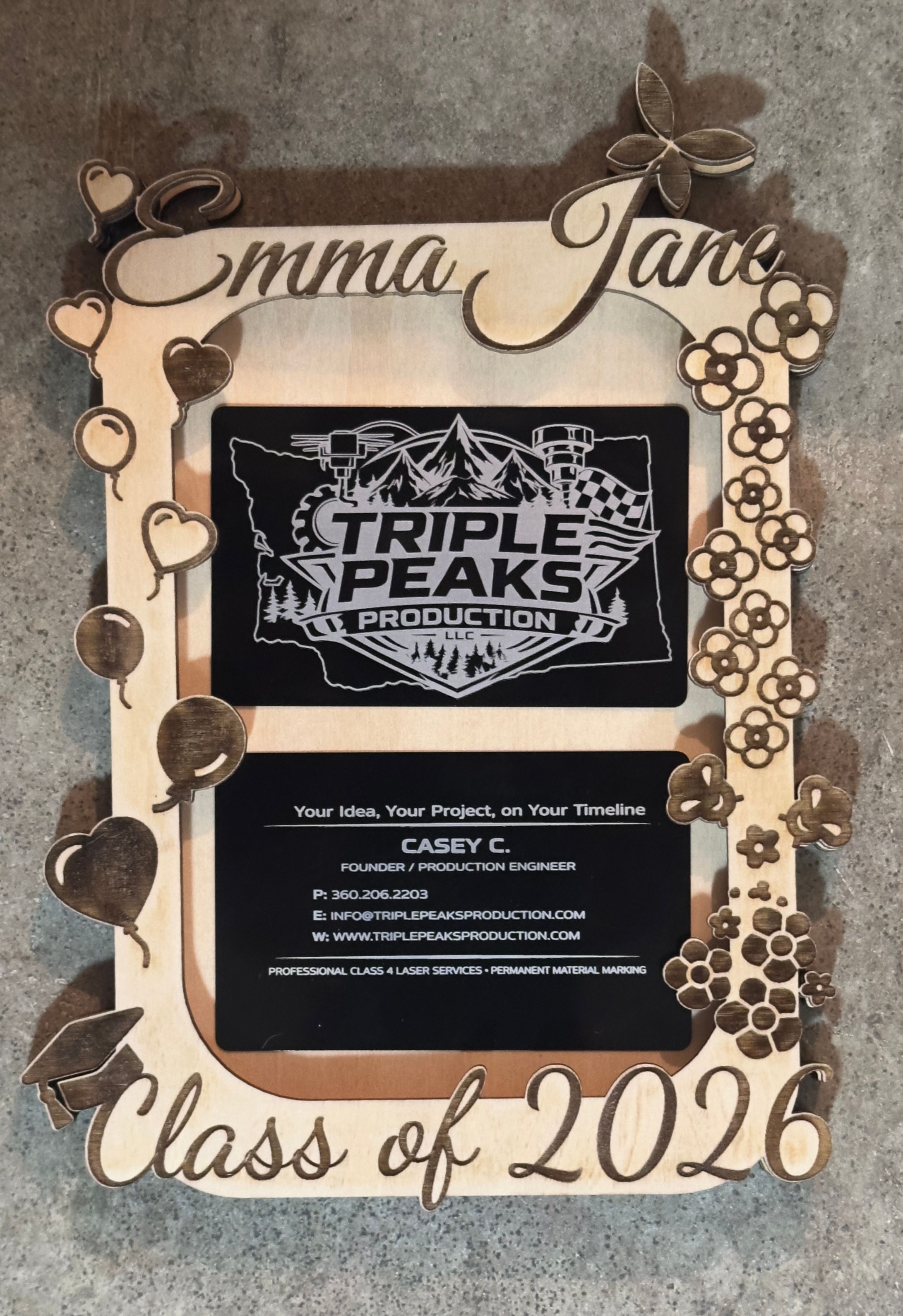 Custom engraved graduation frame with balloons, flowers, and cap