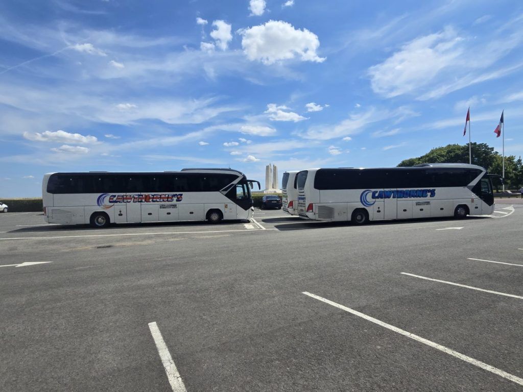 Two Gold Crest coaches ready to depart