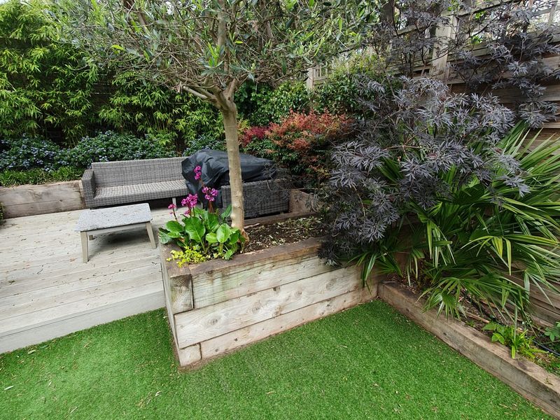Smart automated garden installation in Nunhead SE15 — robotic lawn mower, smart irrigation and automated LED lighting by Wicked Gardens LTD