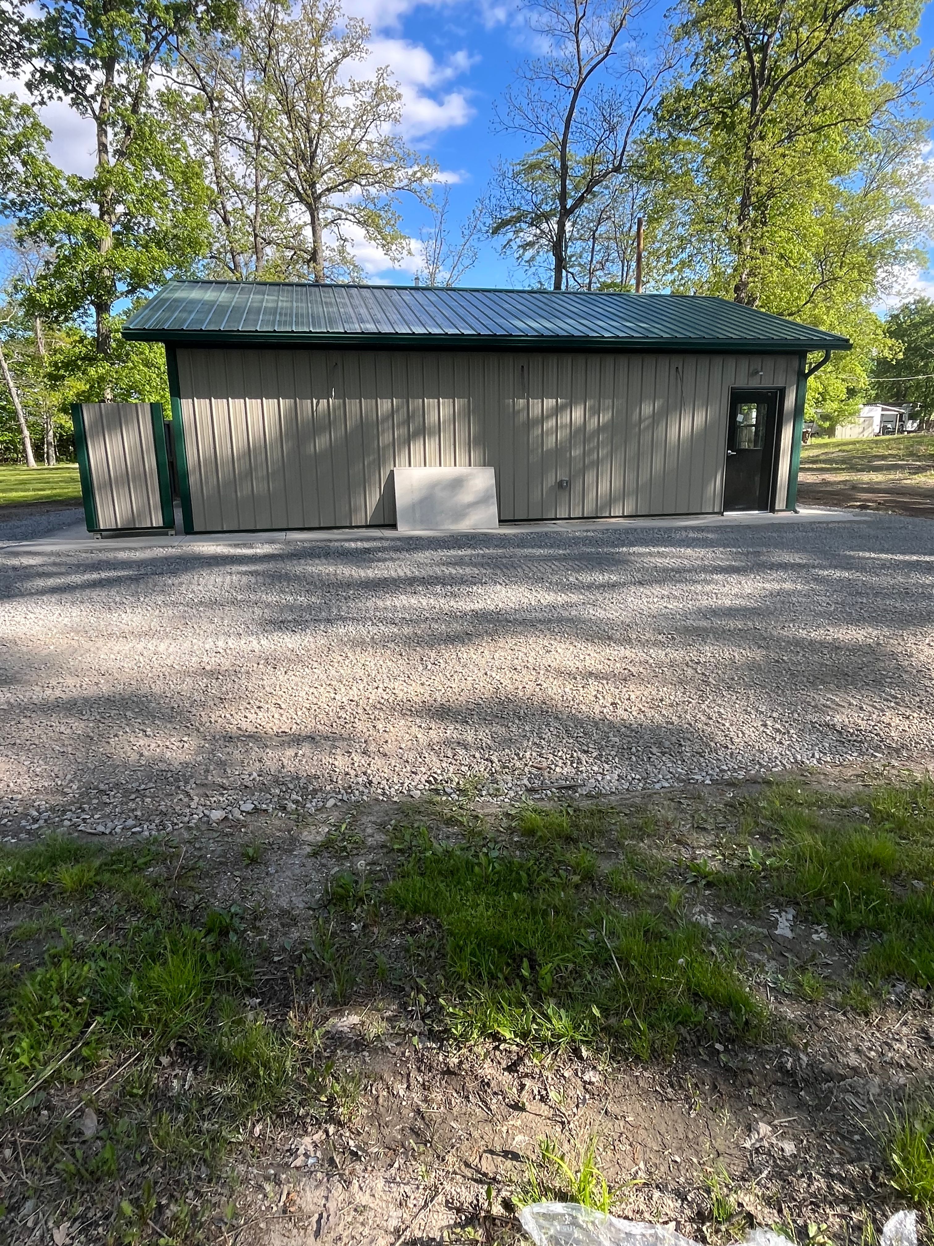 New restroom or utility building exterior at Welcome Woods RV Campground