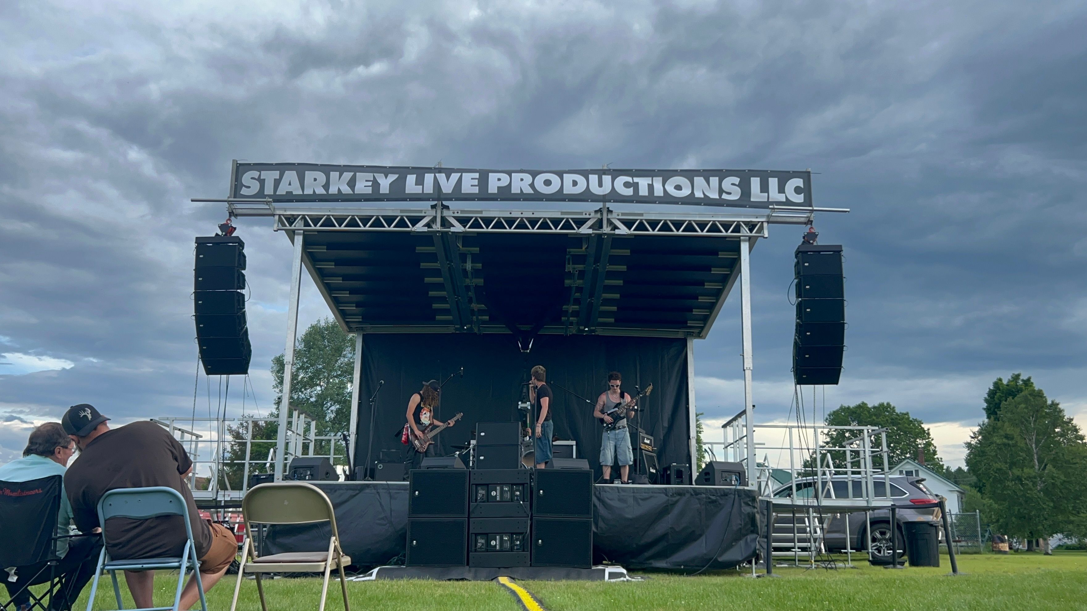 Starkey Live Productions SL75 mobile stage with a band performing live — full stage view