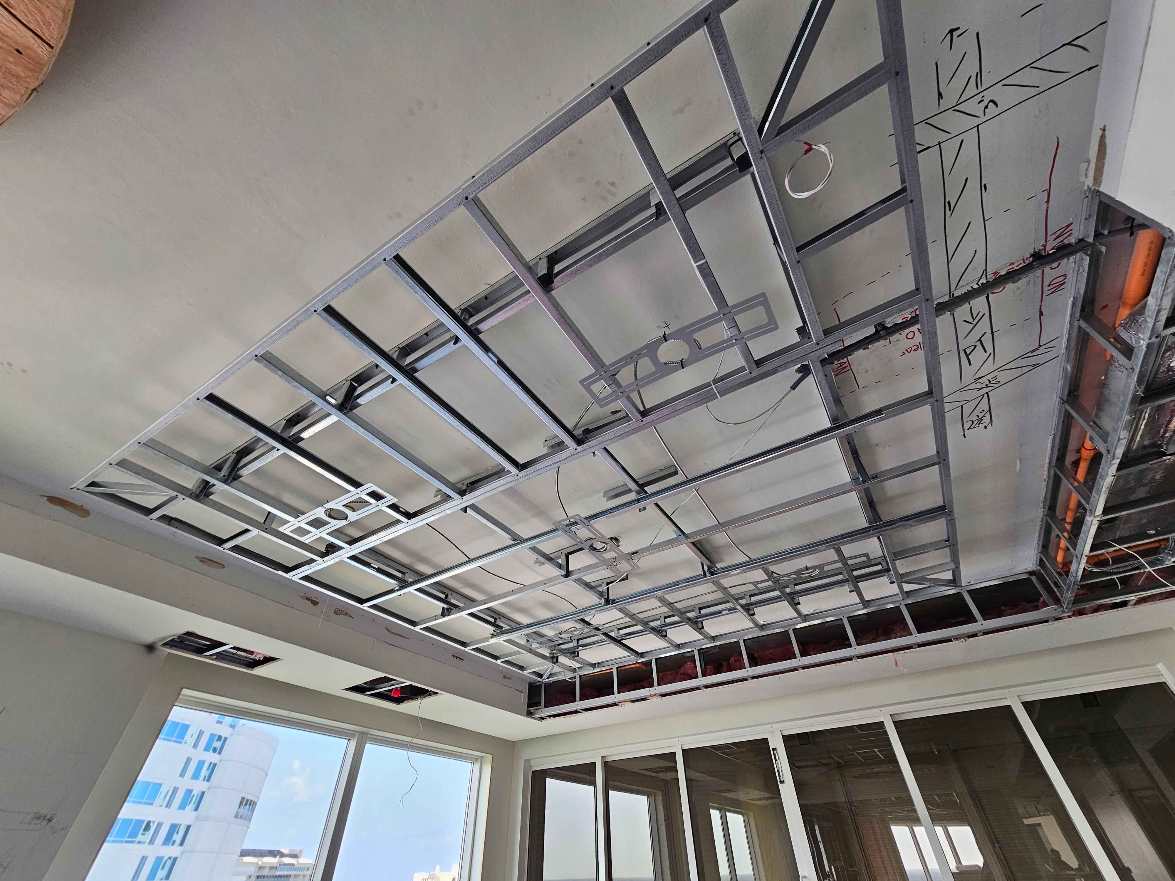 Ceiling layout and framing marks before drywall installation