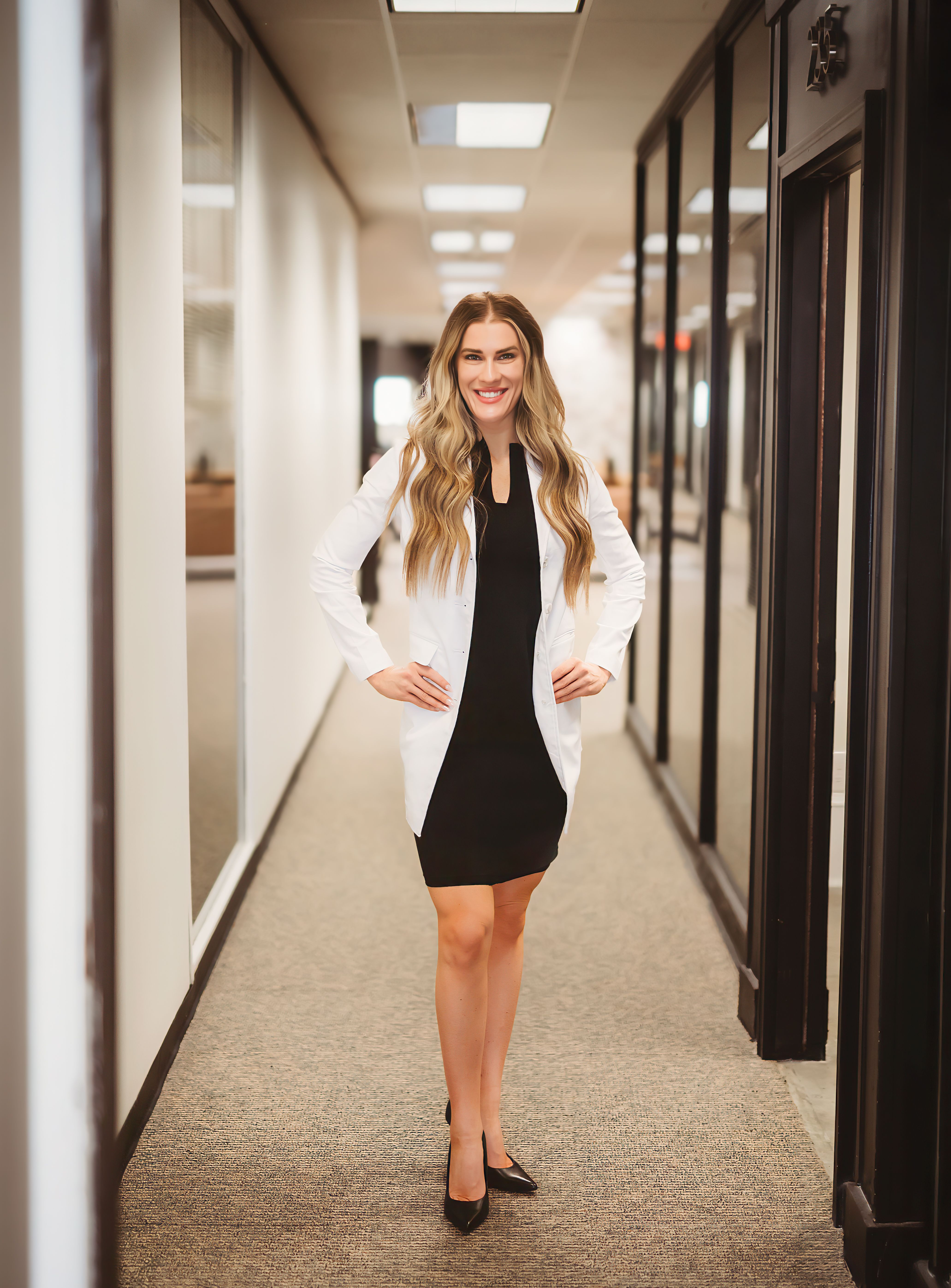 Michelle Perry, APRN, FNP-C standing in hallway — MP Integrative Medicine
