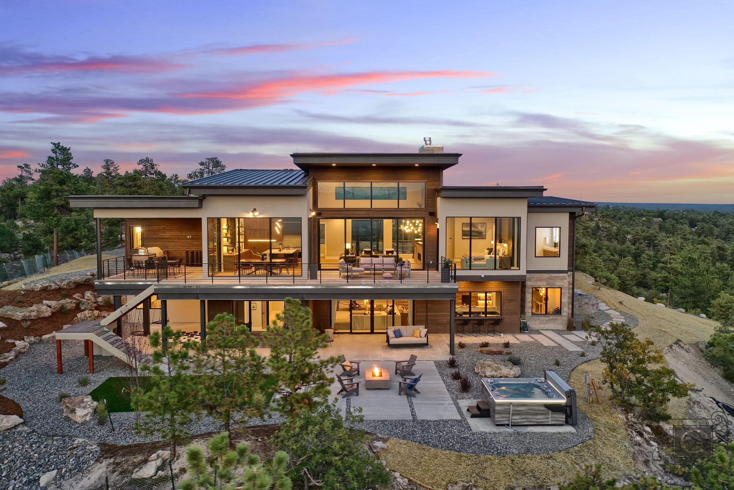 Custom luxury hillside residence with outdoor terrace