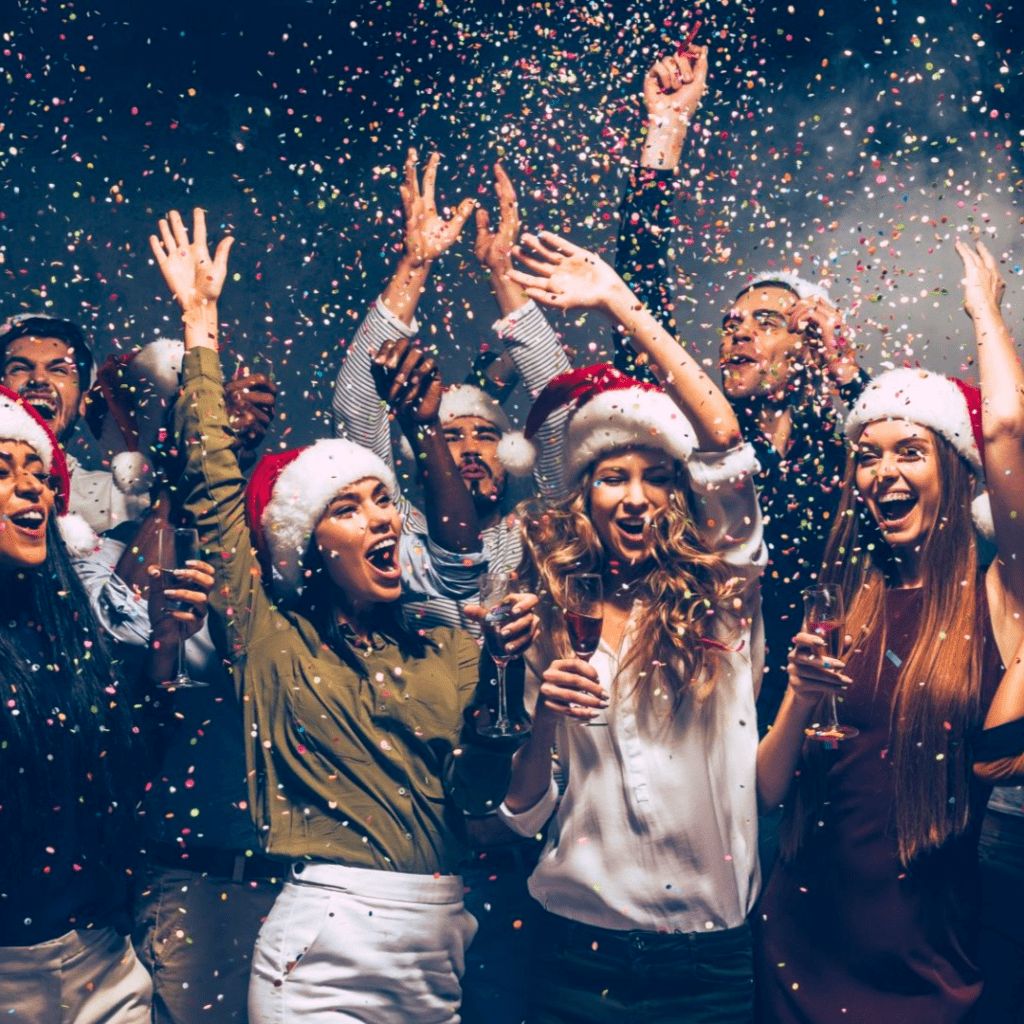 Christmas corporate party with confetti and celebrations