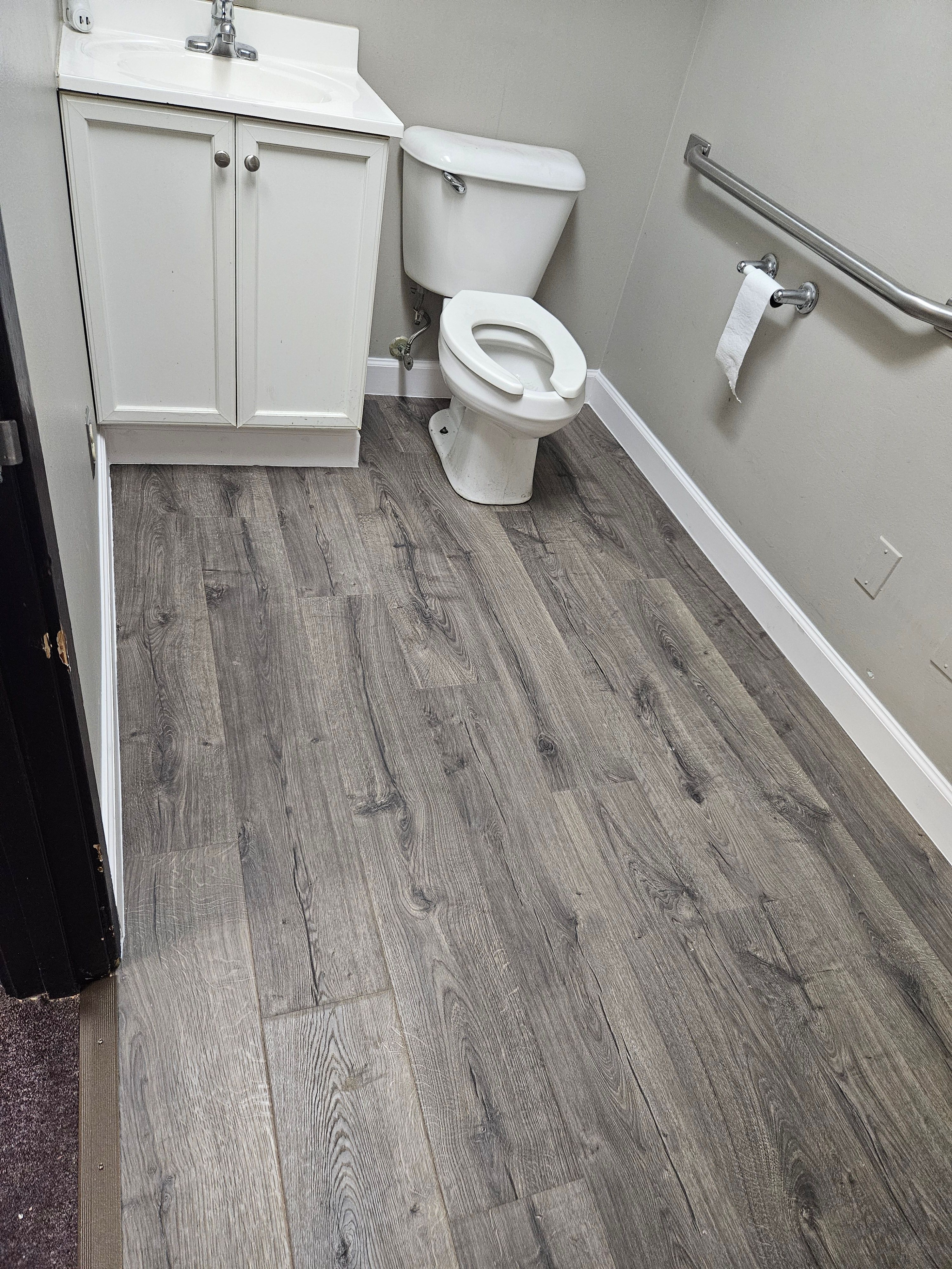 Bathroom remodel with new vanity and flooring in Michigan