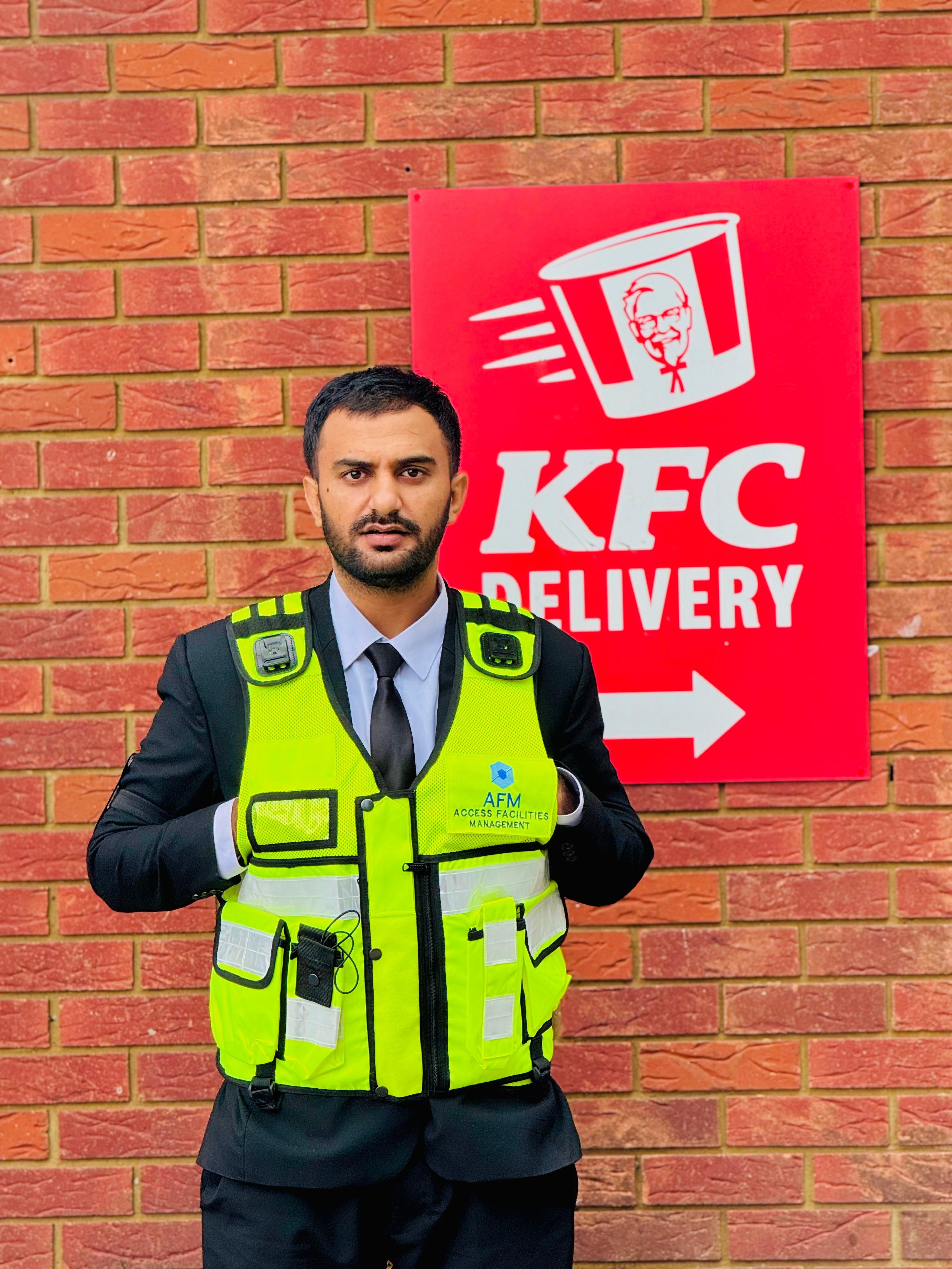 AFM security officer in full gear outside KFC