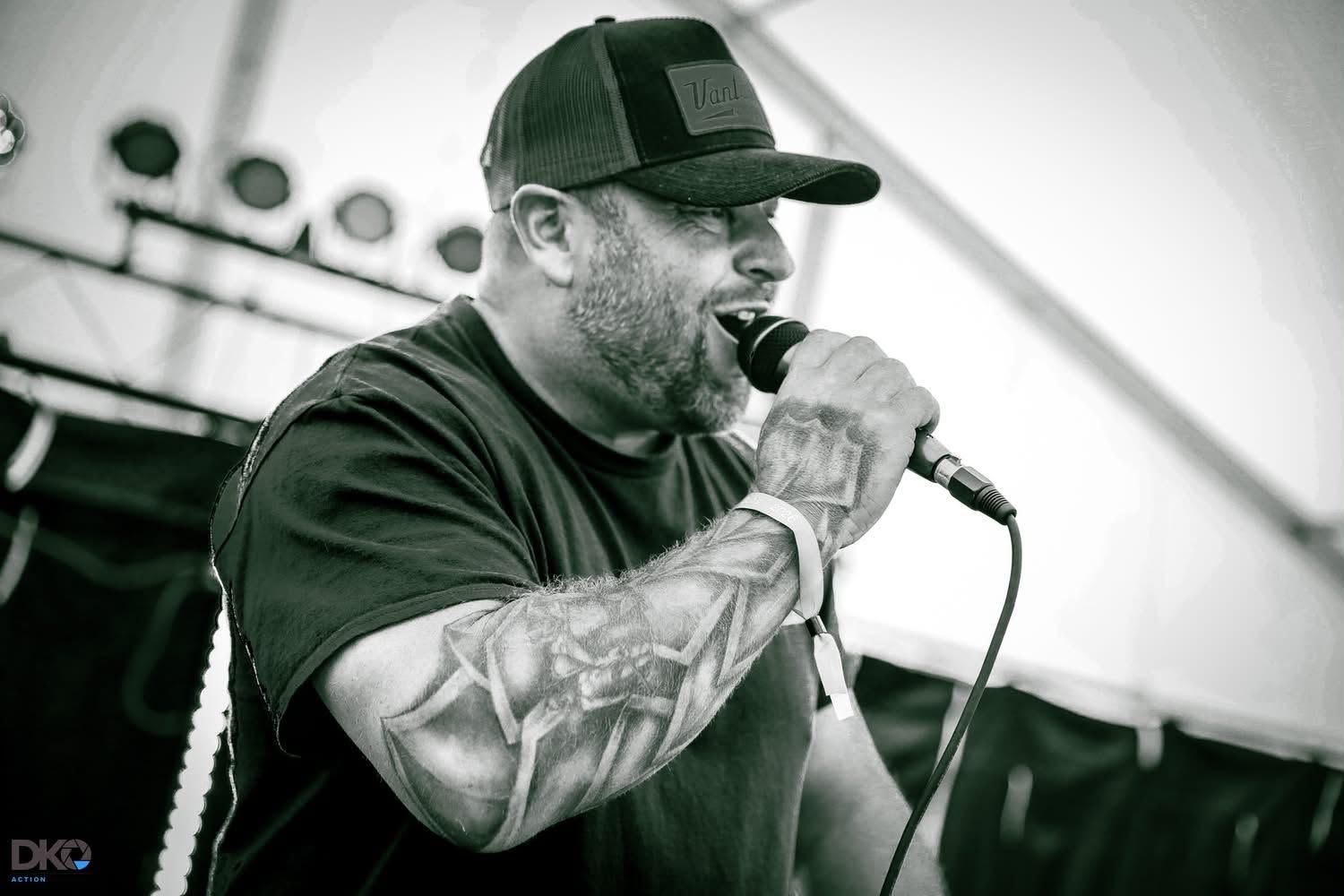 Black and white performance close-up with microphone