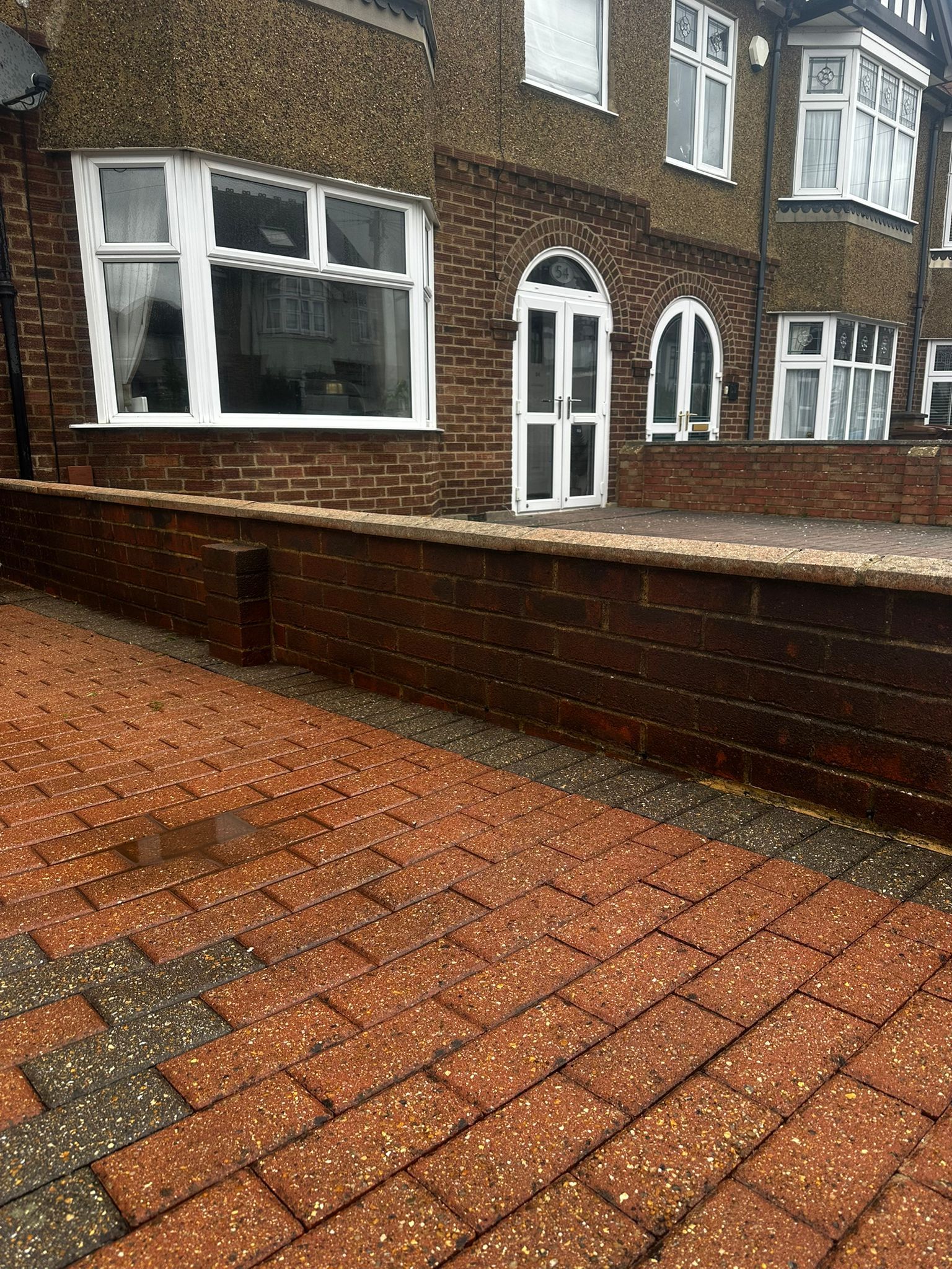 Clean block paving driveway in front of house