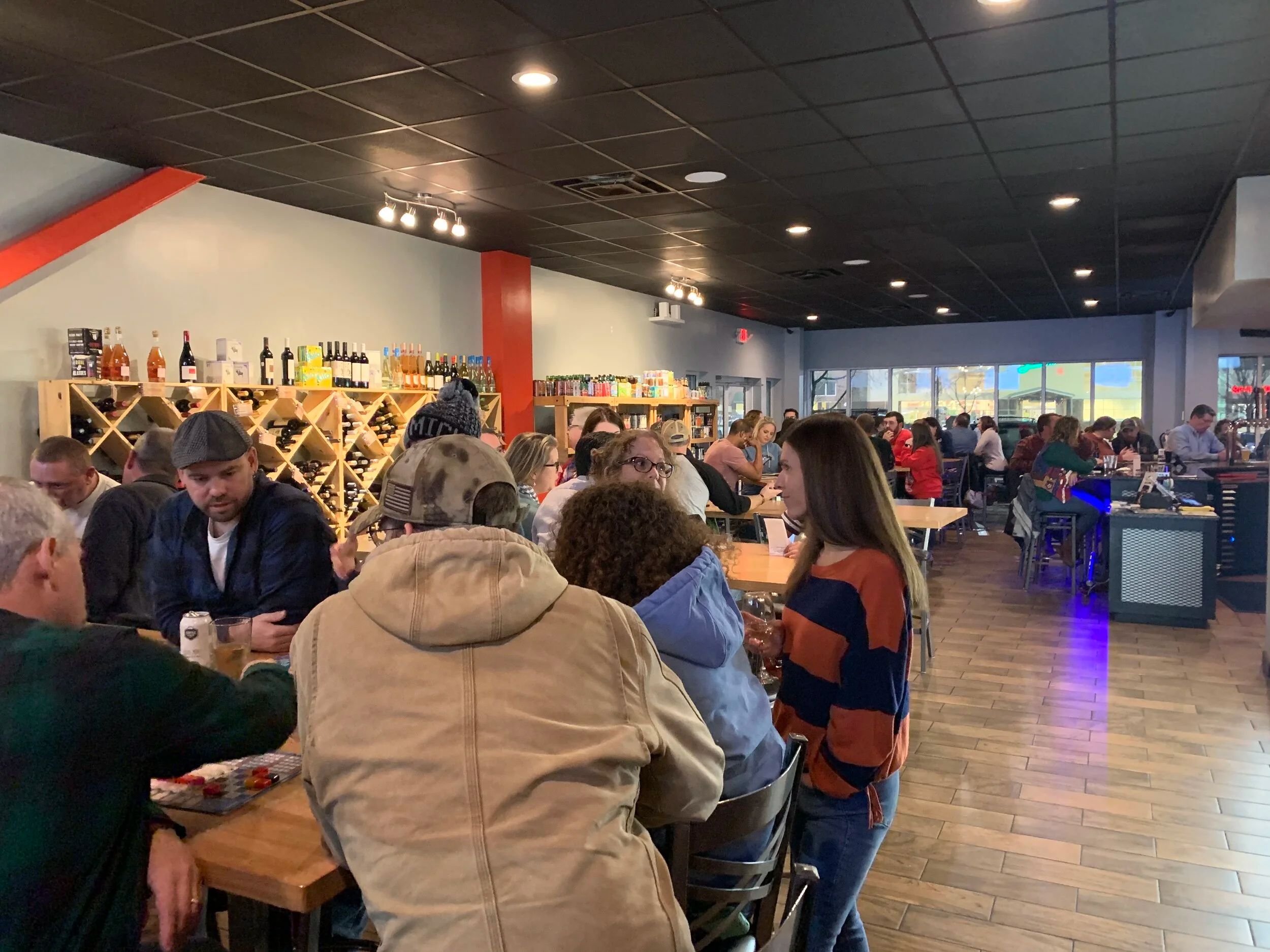 Guests gathered inside Vortex Bottle Shop in Harrisburg NC